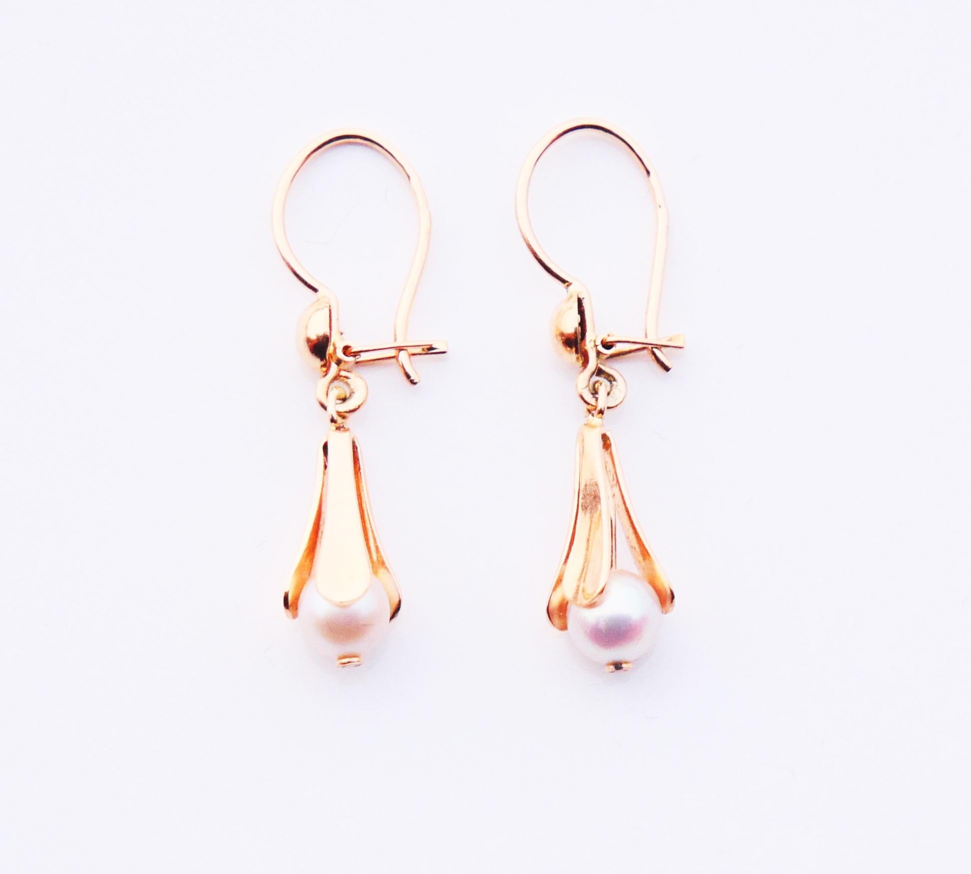 A pair of nice flower bell shaped earrings made in solid 18K Orange Gold with Pearls. Likely Swedish maker, 18K, no date marks. Made ca. 1930s - 1950s. Pearls secured with Gold sticks hidden inside the buds. Each earring is 30 mm long suspended.