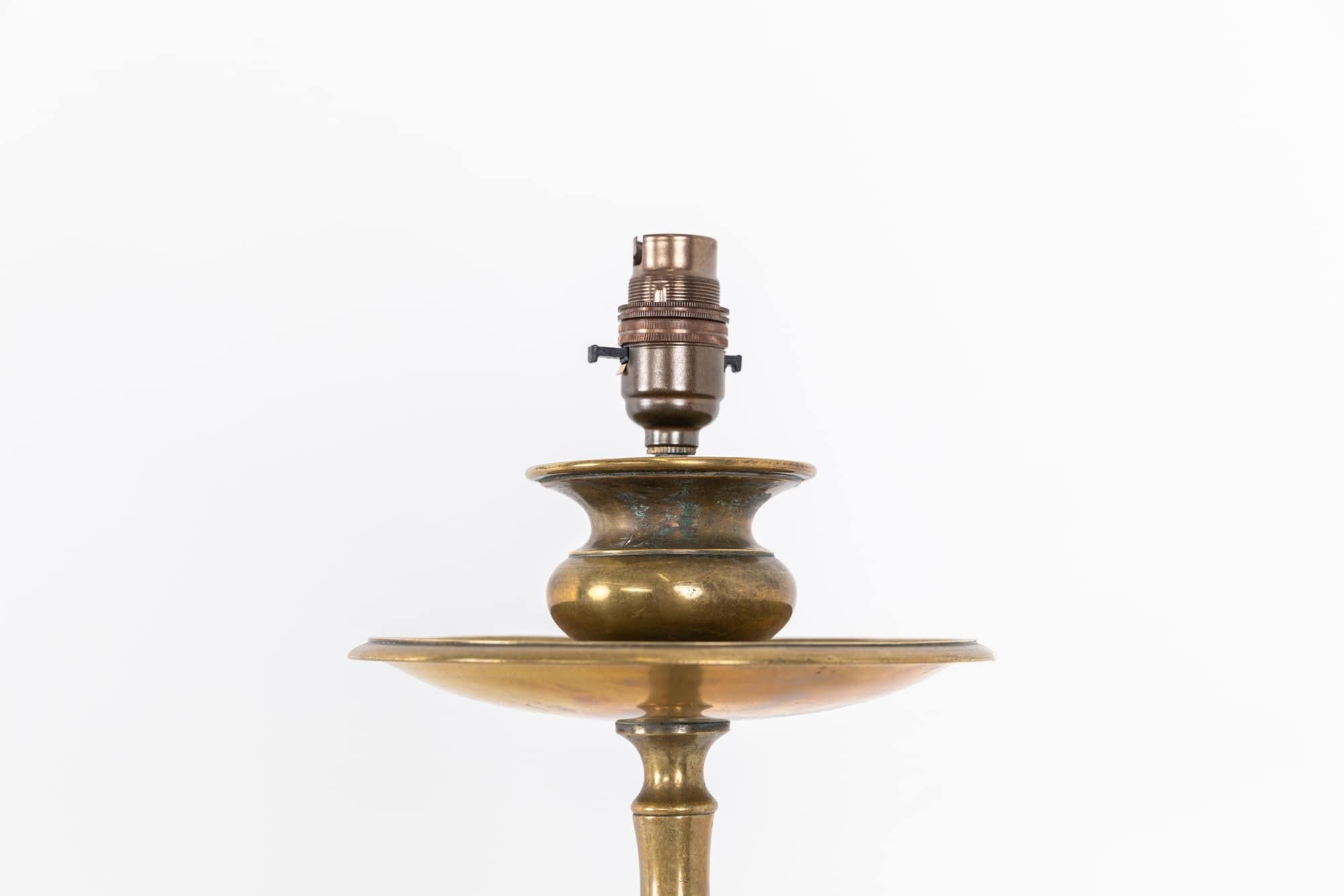 

An elegantly formed large brass table lamp. c.1900

Likely converted from a former candlestick, this lamp is of exceptional quality and has developed a beautiful patina over time.

Rewired with 2m of black twist flex and BS 3-pin plug.
