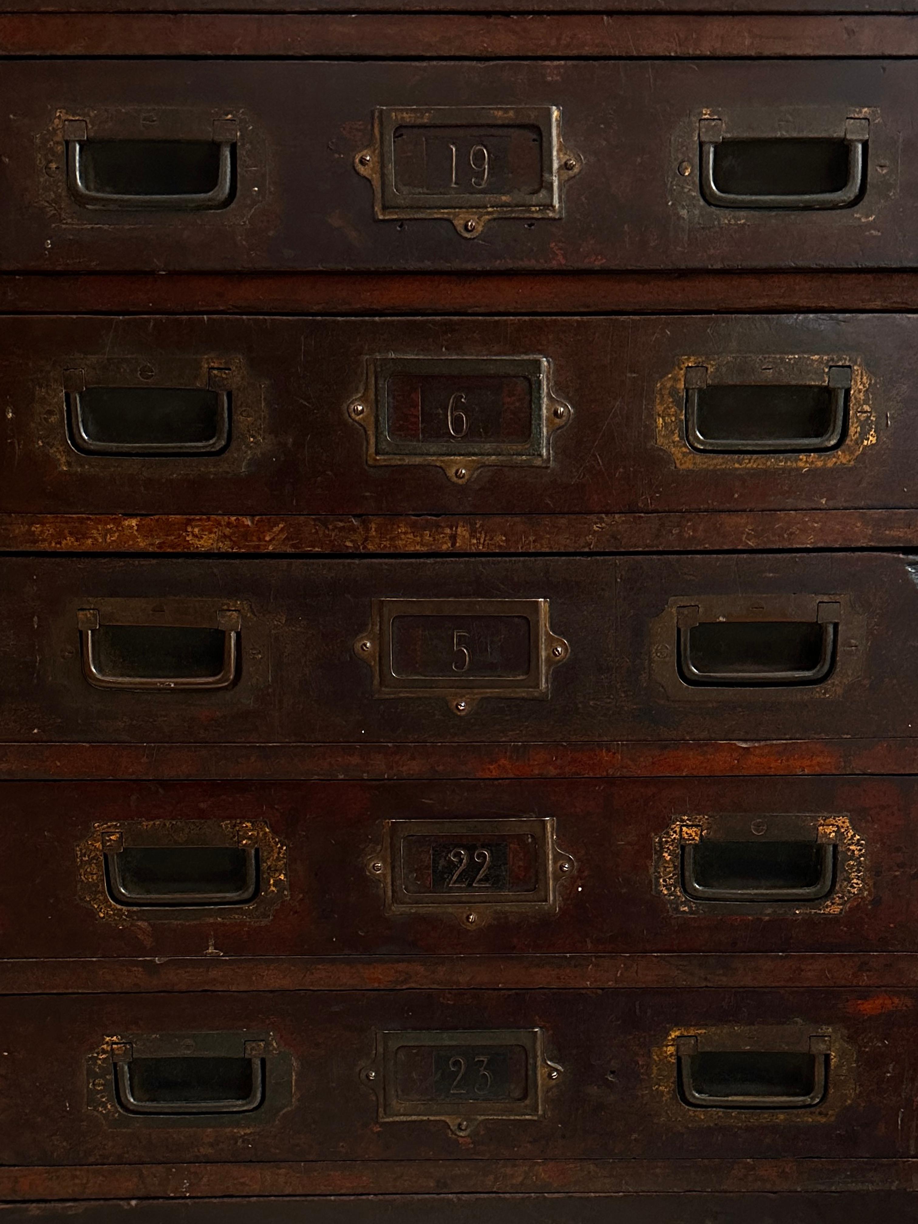 - A wonderful bank of mahogany military campaign drawers, English circa 1920.
- The drawers are of a fine heavy quality, beautifully crafted with dovetail joints and recessed military style brass handles.
- Each of the 16 drawers still retain