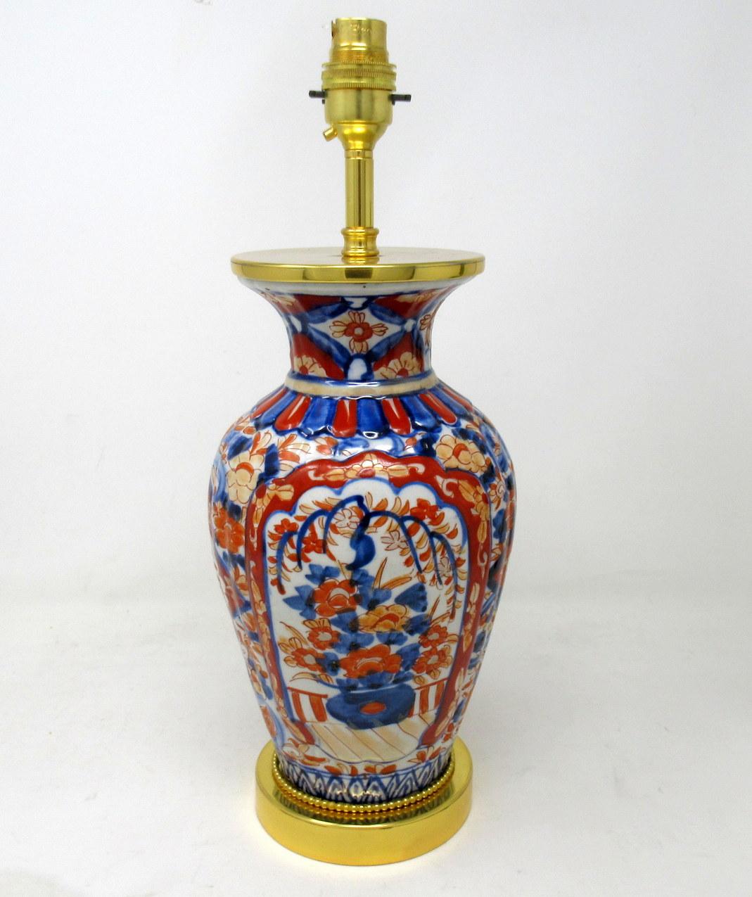 Stunning traditional Japanese Imari bulbous form porcelain ovoid form glazed porcelain, of compact proportions, now converted to an electric table lamp, complete with later ormolu circular stepped base. Third quarter of the Nineteenth Century. 

The