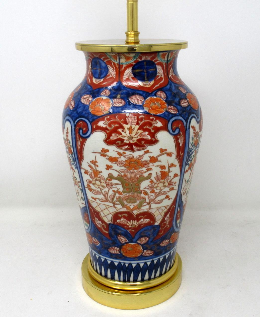 Stunning Traditional Japanese Imari Porcelain Ovoid Form Glazed Porcelain, of quite generous proportions, now converted to an electric Table Lamp, complete with later Ormolu Circular stepped base. Third quarter of the Nineteenth Century. 

The