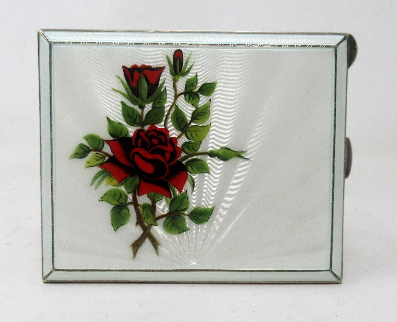 A superb example of a mid century heavy gauge Guilloche and enameled Sterling Silver Gilt hinged lidded Card Case of outstanding quality and condition for such an early silver item. 

The rectangular cover enameled in colours of red and greens