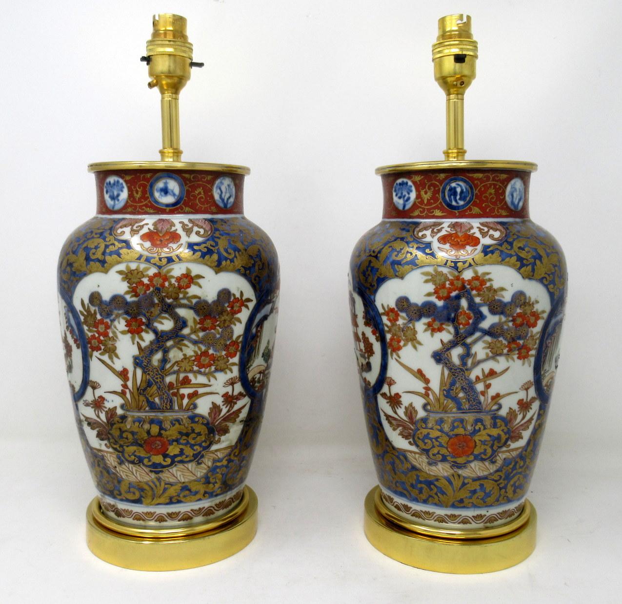 Stunning pair of Traditional Chinese or Japanese Imari Bulbous form porcelain vases of generous proportions, unmarked but firmly attributed to Koransha Potteries. Now converted to a Pair of electric table lamps, complete with their later Ormolu