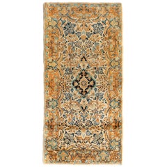 Petit tapis persan vintage Kirman ivoire, bleu doré et à fleurs, vers les années 1930