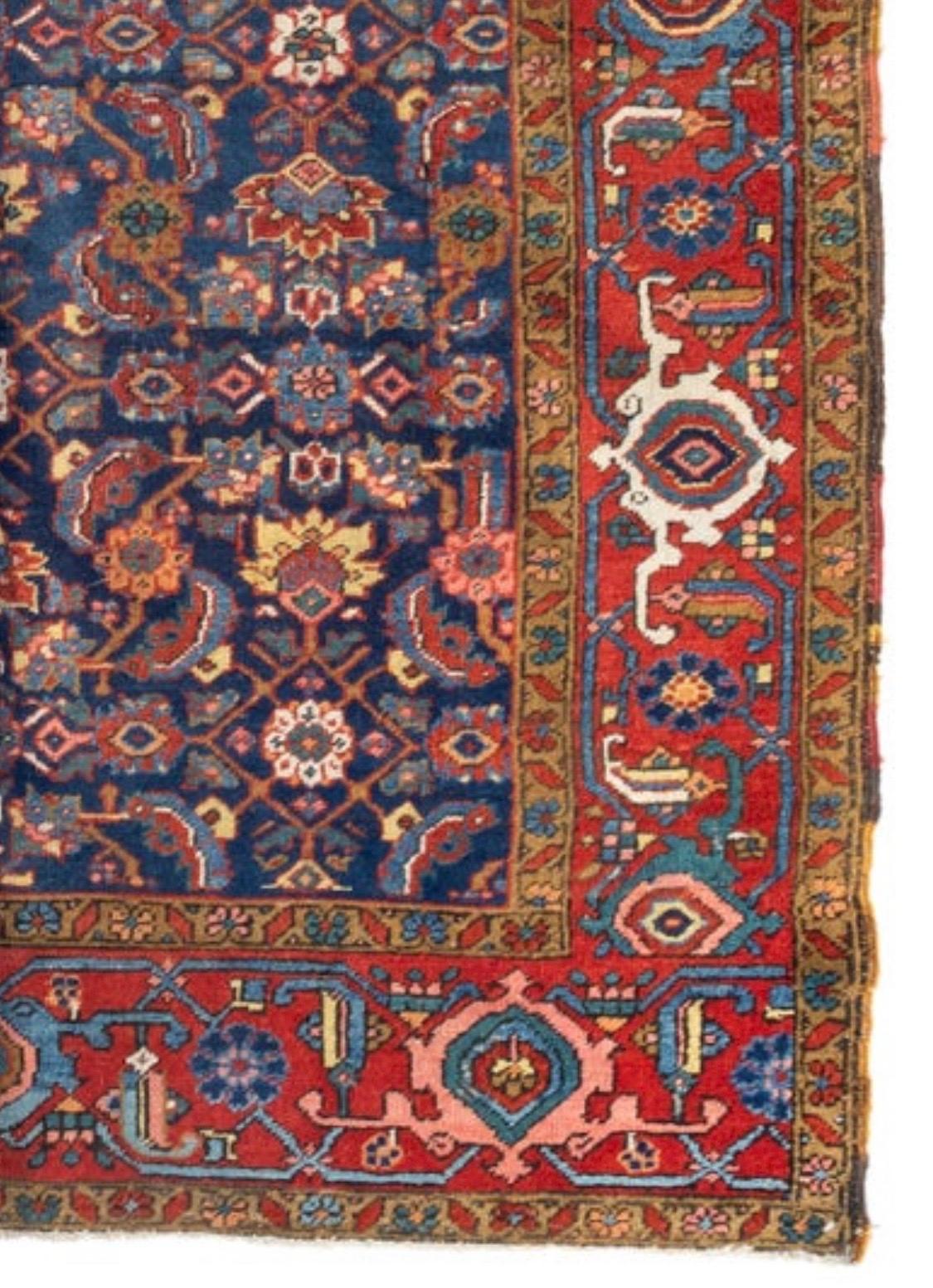 Hand-Knotted Antique Vintage Persian Red Gold Navy Blue Geometric Heriz Area Rug, circa 1920s For Sale