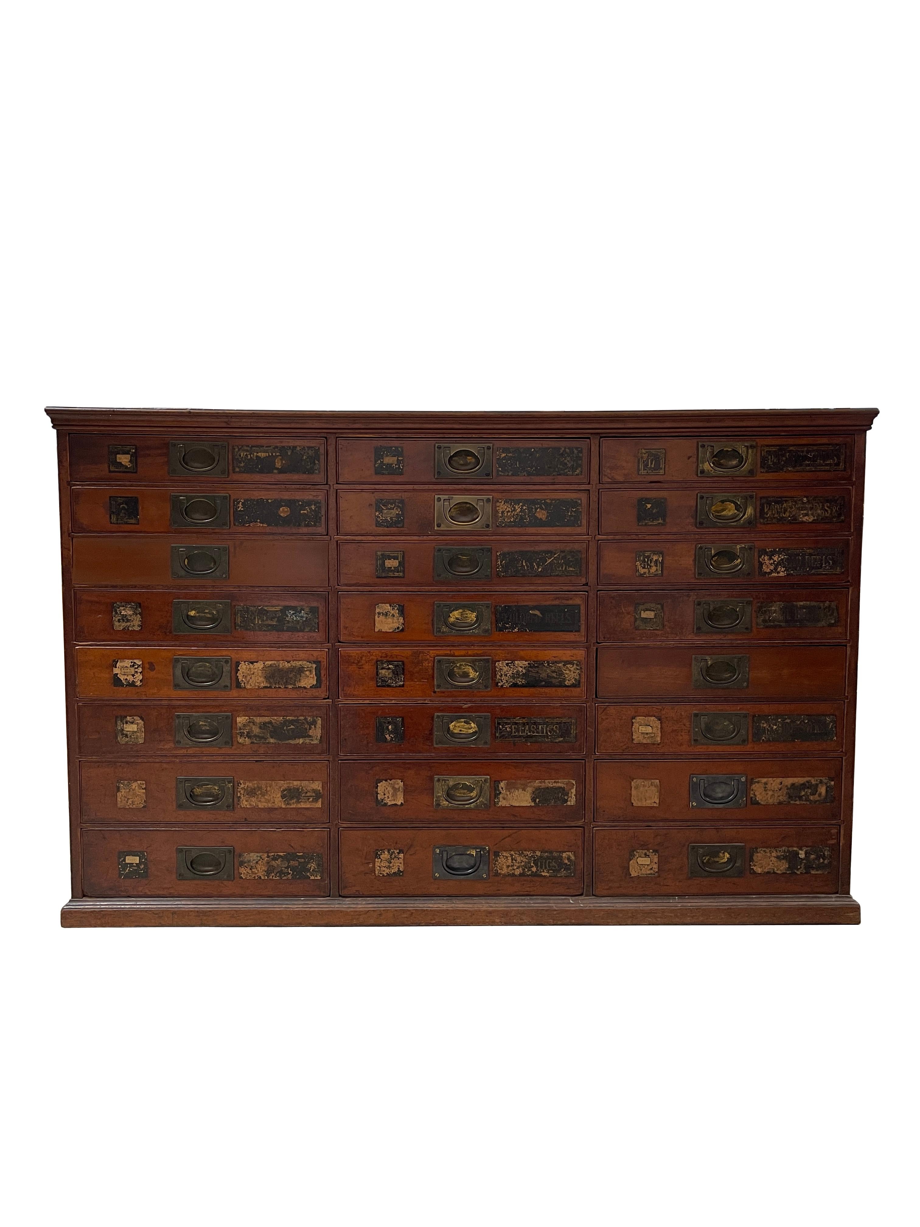 - A beautiful flight of Victorian drapers haberdashery drawers, English, 19th century.
- The drawers are in stunning original condition and are made from satin walnut or mahogany. 
- There are 24 graduating drawers in total each with their