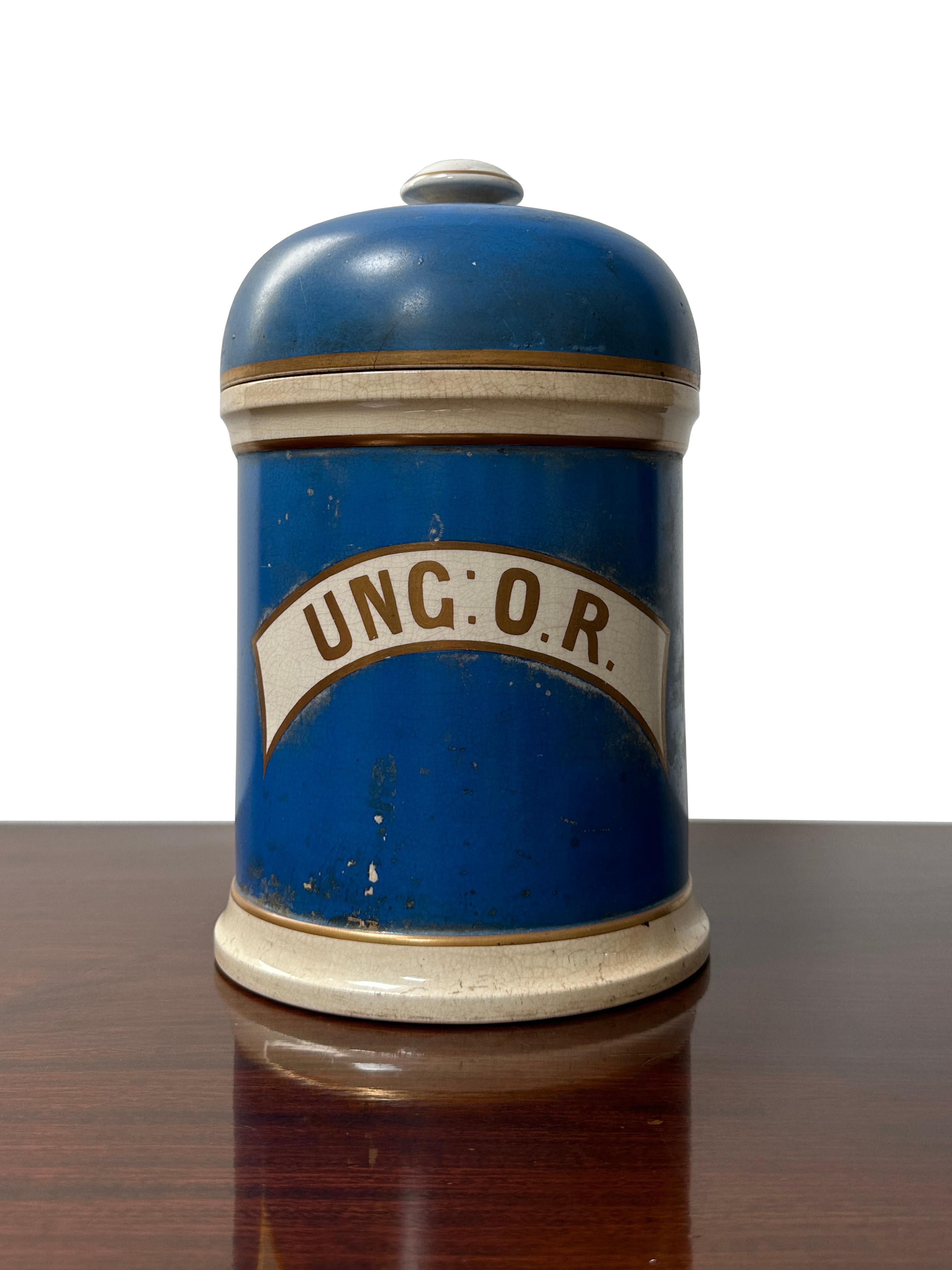 - A beautiful blue, white and gold Victorian apothecary jar, circa 1900.
- The jar still contains its original blue, white and gold paint with the inscription 'UNG: O.R.' across the front, wonderful example.
- The lid has had a break at some point