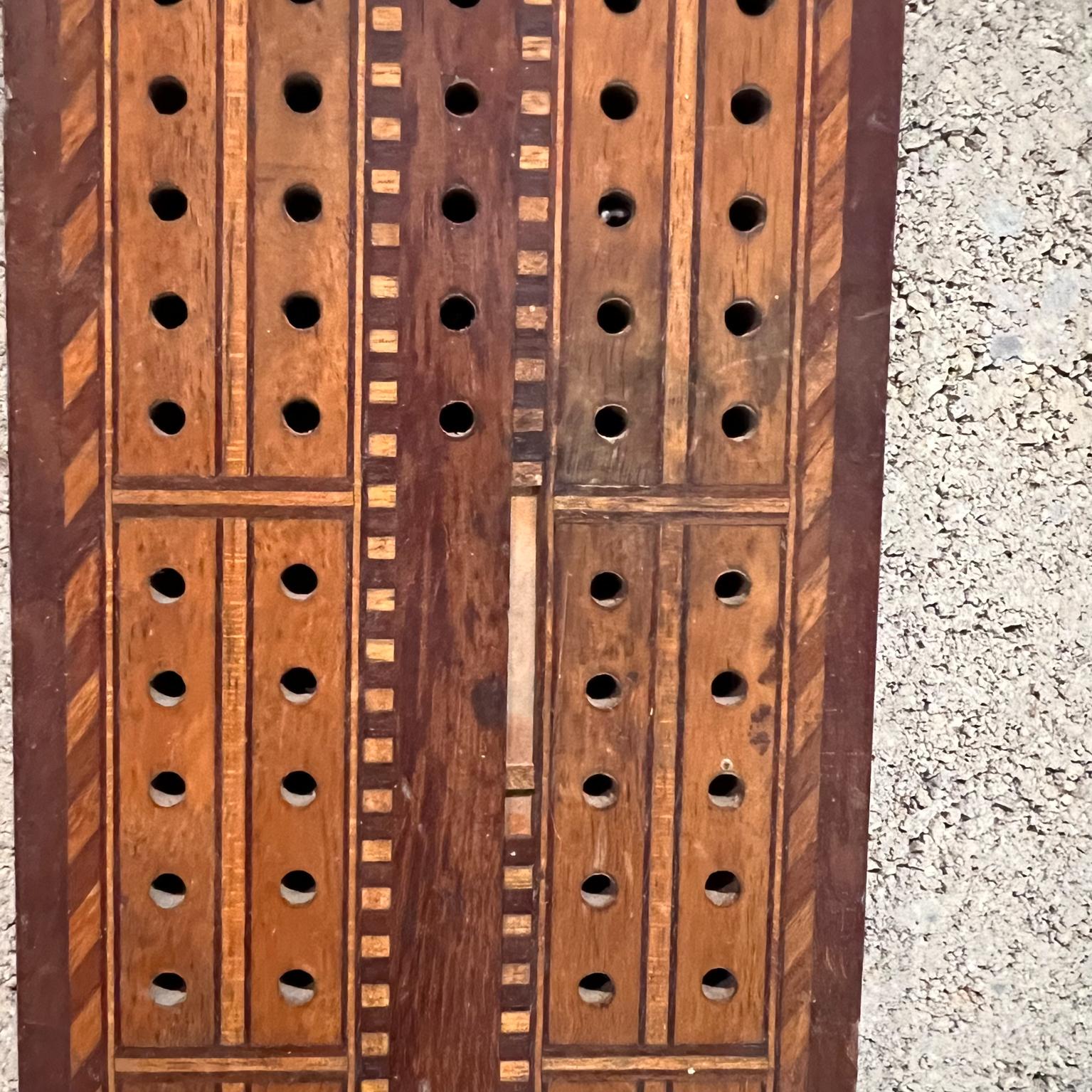 antique cribbage board