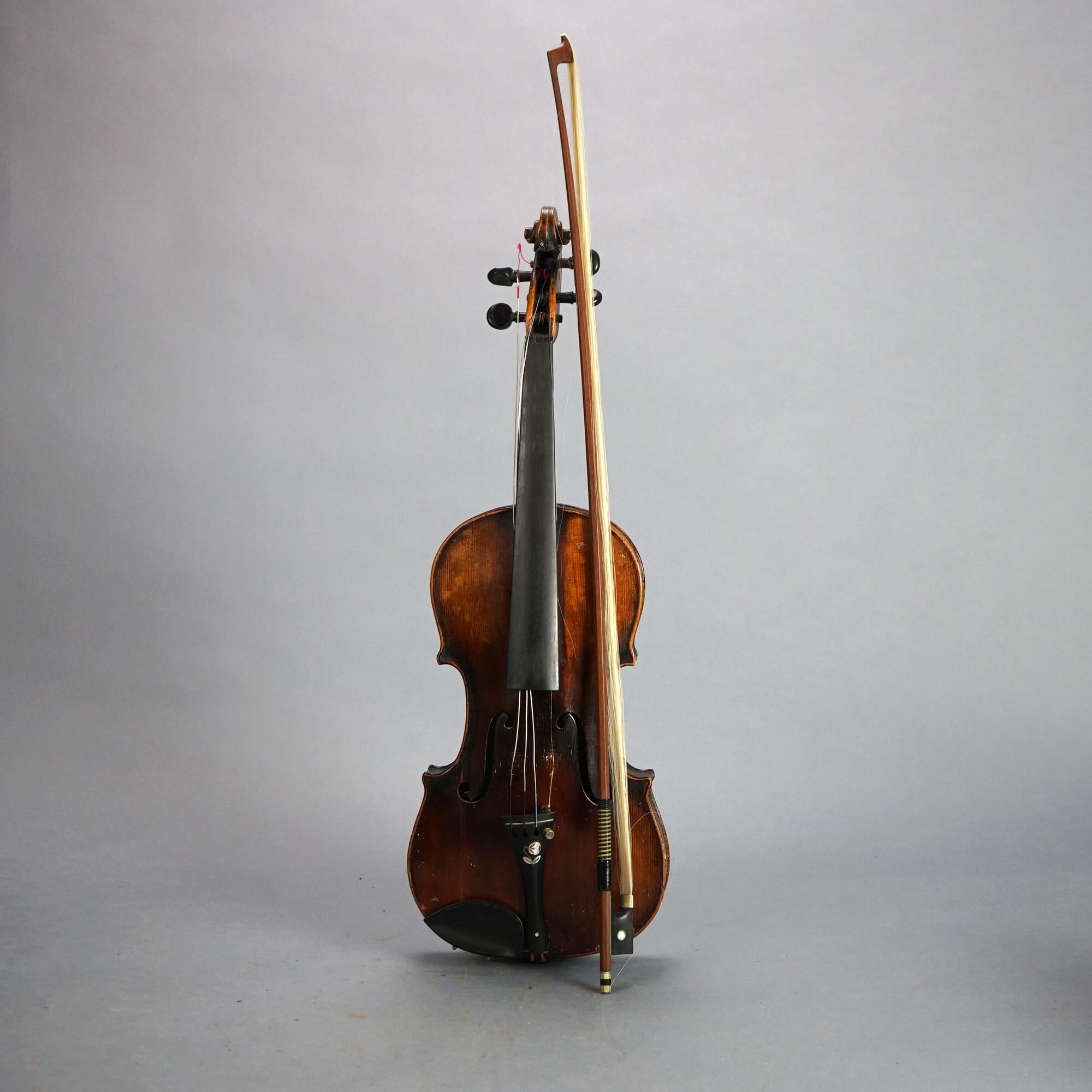 Antique Violin with Bow & Case C1920, Joseph Guarnari Fregit 

Measures- Case: 31.25''H x 10.5''W x 5''D; 23.5'' x 8''W x 3''D