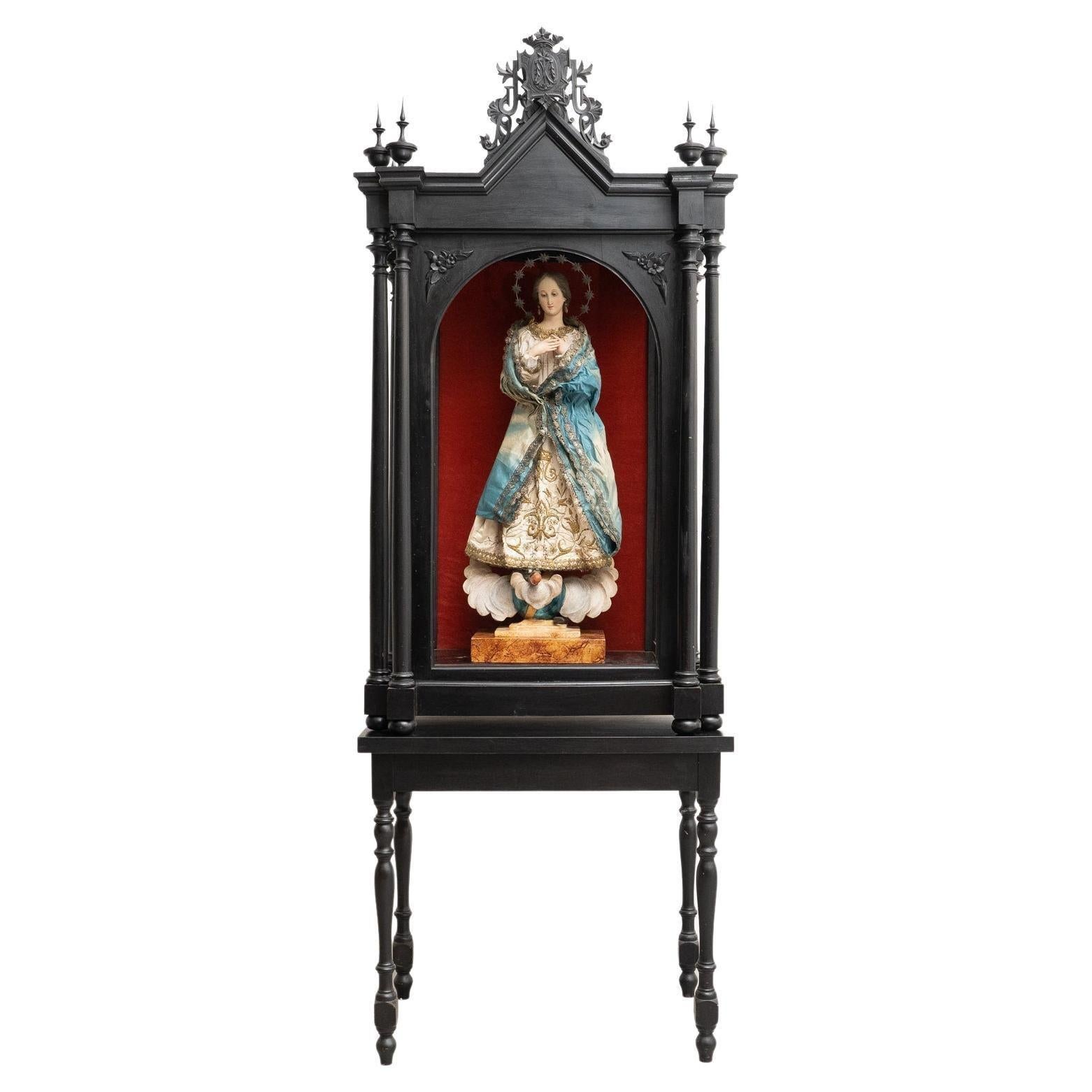Antique Virgin Sculpture on a Wooden Glass Door Cabinet, circa 1940