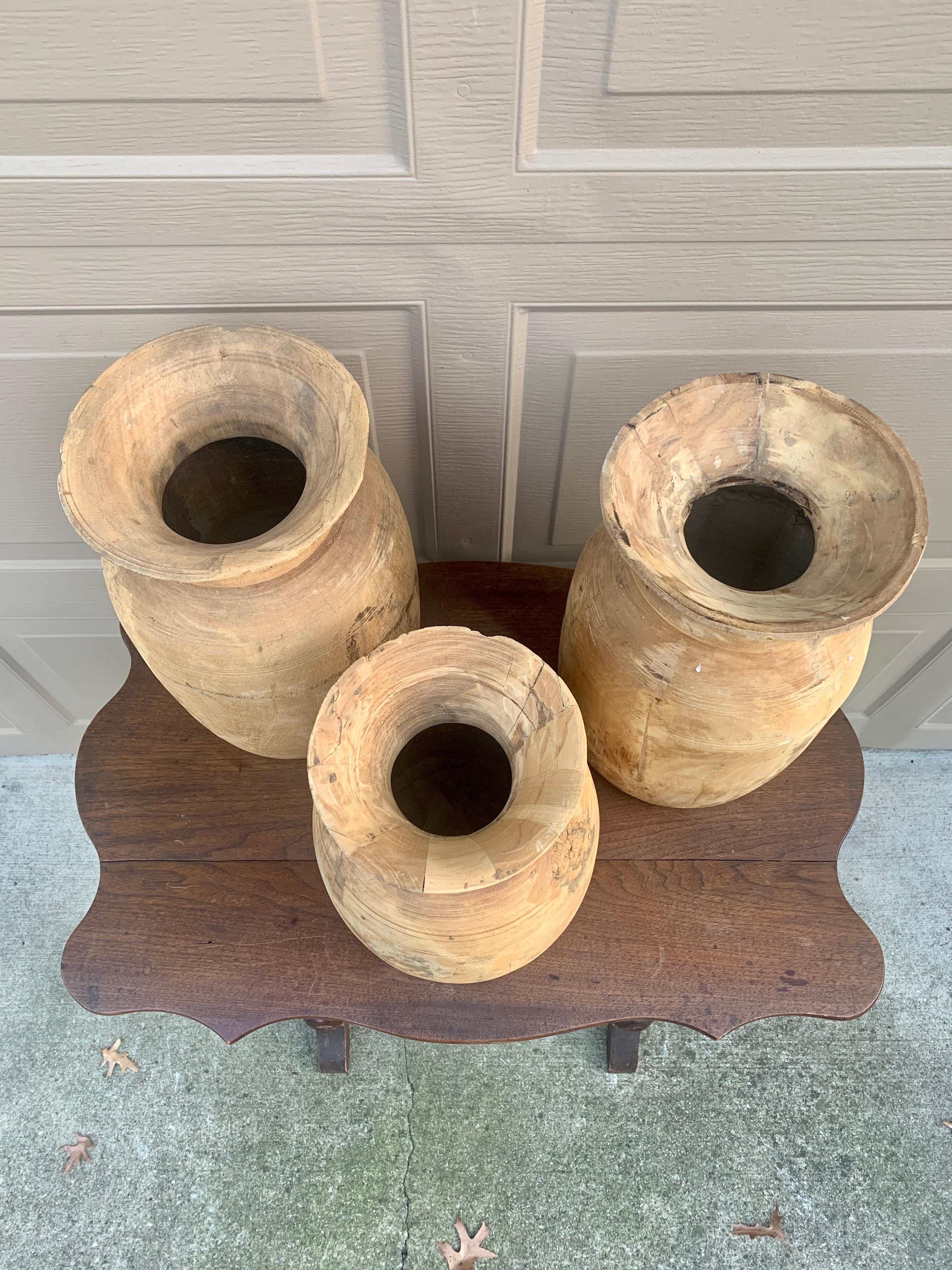 A gorgeous set of three antique Organic Modern Wabi-Sabi style hand-turned bleached raw wood vessels 

India, Circa early 20th century

Tallest measures: 9.5
