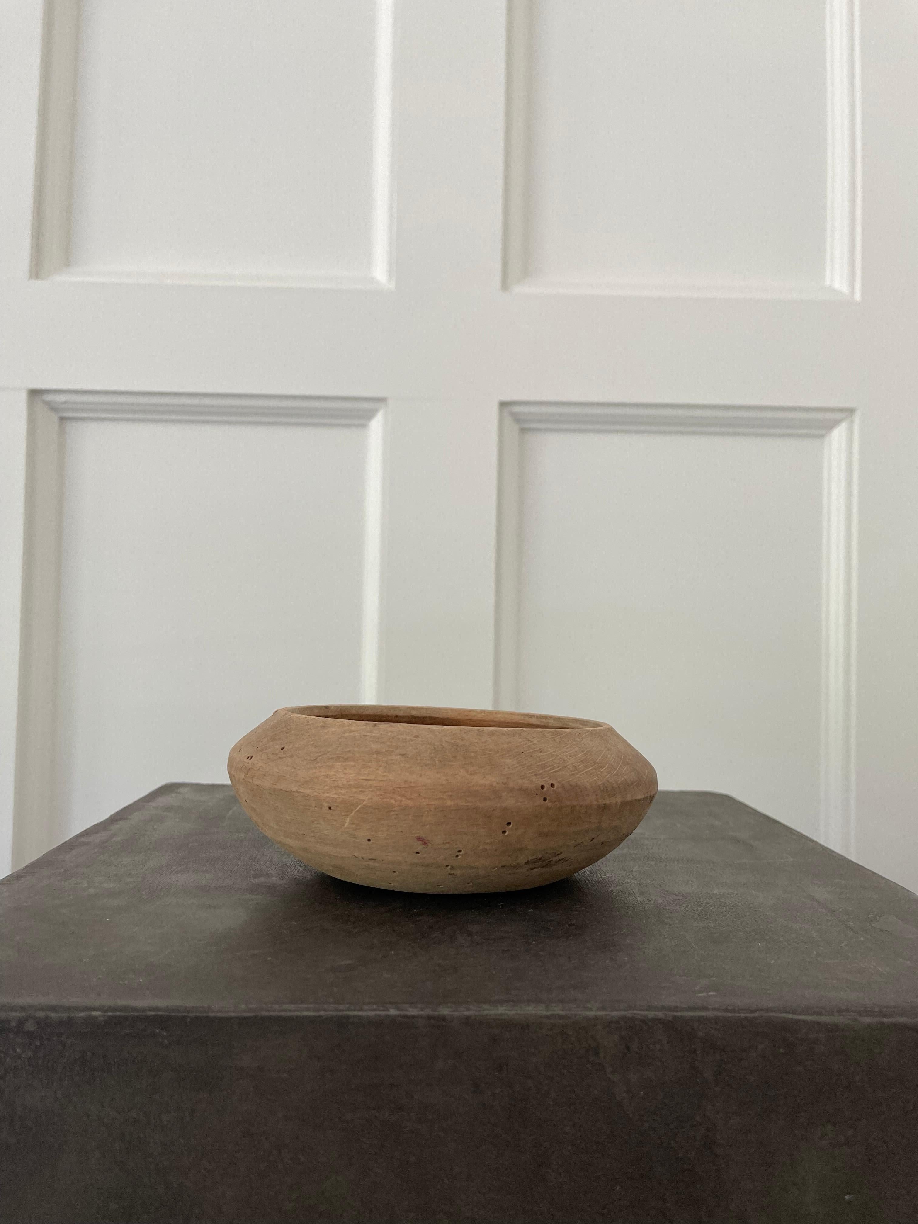 Hand carved wabi-sabi wooden bowl. Antique from the early 1900's. Perfect catchall or sculptural piece.