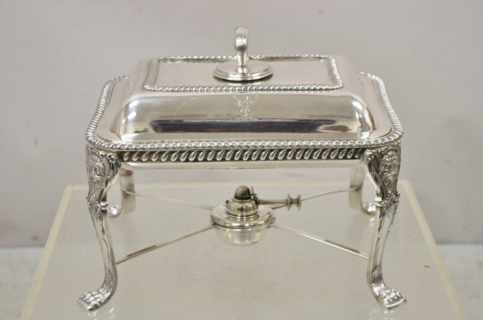 Antique Walker & Hall Silver Plated Chafing Serving Dish Warmer with Lions. Item features a  lion and paw feet, removable dish, original hallmark, very nice antique item, great style and form. Circa Early to Mid 20th Century. Measurements: 10