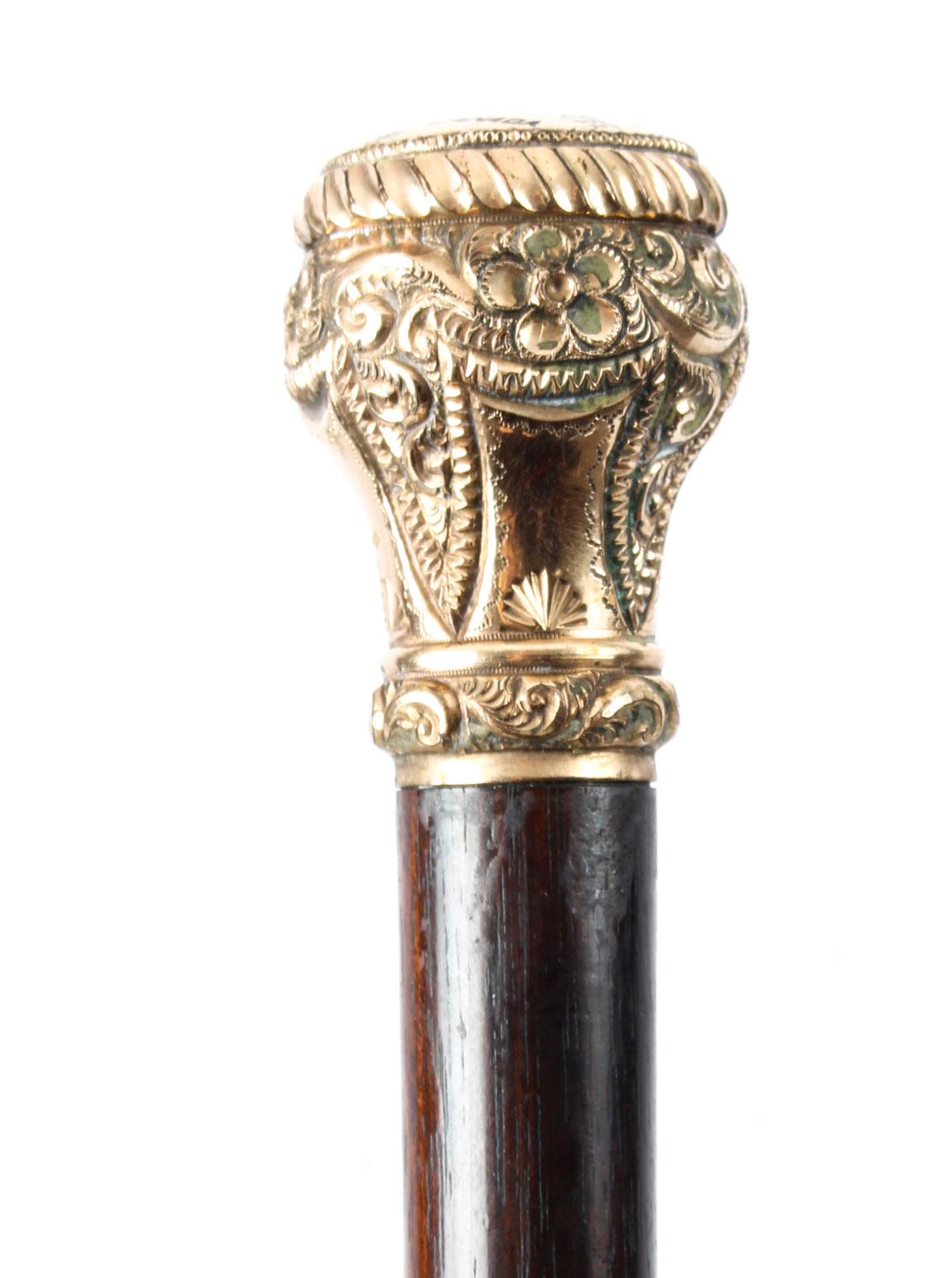 This is a beautiful antique Victorian walking cane with 9-carat gold pommel, late 19th century in date.
 
The gold handle is beautifully cast with foliate and florals decoration, it has a Malacca shaft with its original brass ferrule on the