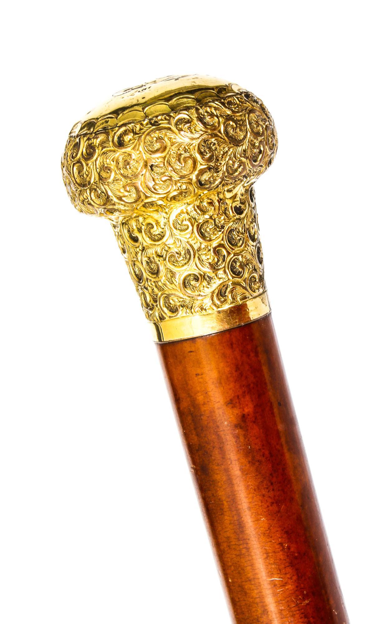 This is a beautiful antique Victorian gentleman's walking cane with a lovely ormolu domed pommel, dating from the late 19th century.
 
The elegant ormolu handle is beautifully chased with foliate and floral decoration and features an engraved