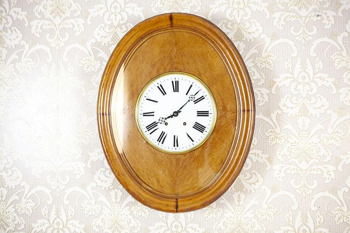 Antique wall clock from the interwar Period

We present you a wall clock placed in an oak case with a glazed elliptical lid, which protects the clock.
The gong is by Gustav Becker. The clock strikes quarters, halves, and full hours, and each is
