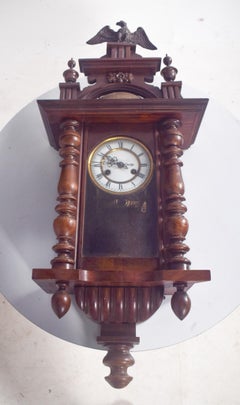Antique Wall Clock with Carved Eagle