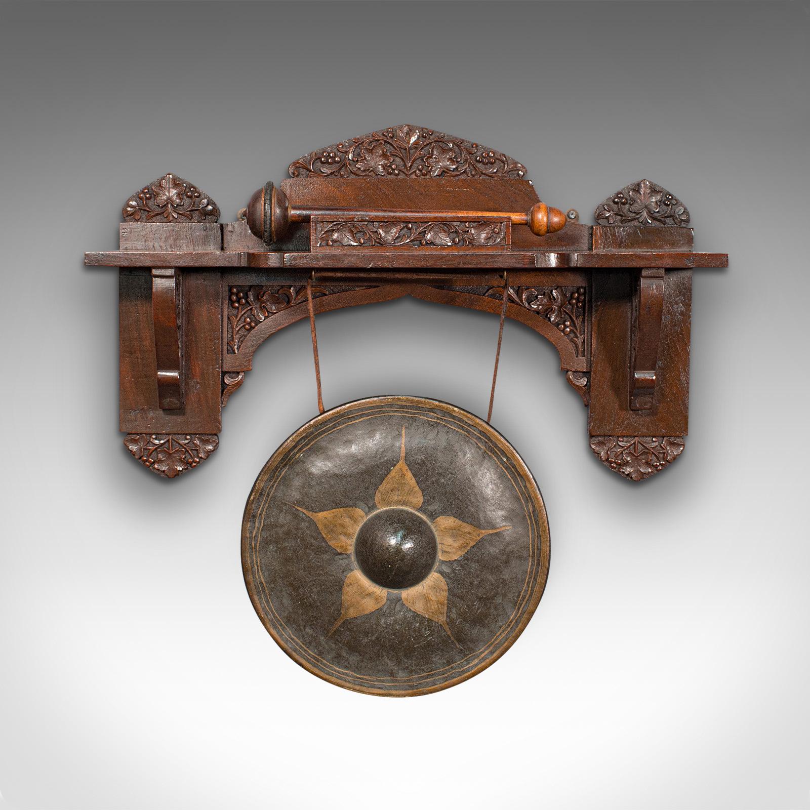 This is an antique wall gong. An Indian, oak and brass dinner or ceremonial monastery chime, dating to the late 19th century, circa 1900.

Fascinating ceremonial gong with pleasing timbre
Displays a desirable aged patina and in good order
Select