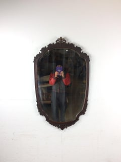 Antique Wall Mirror with Ornate Carved Wood Oval Frame