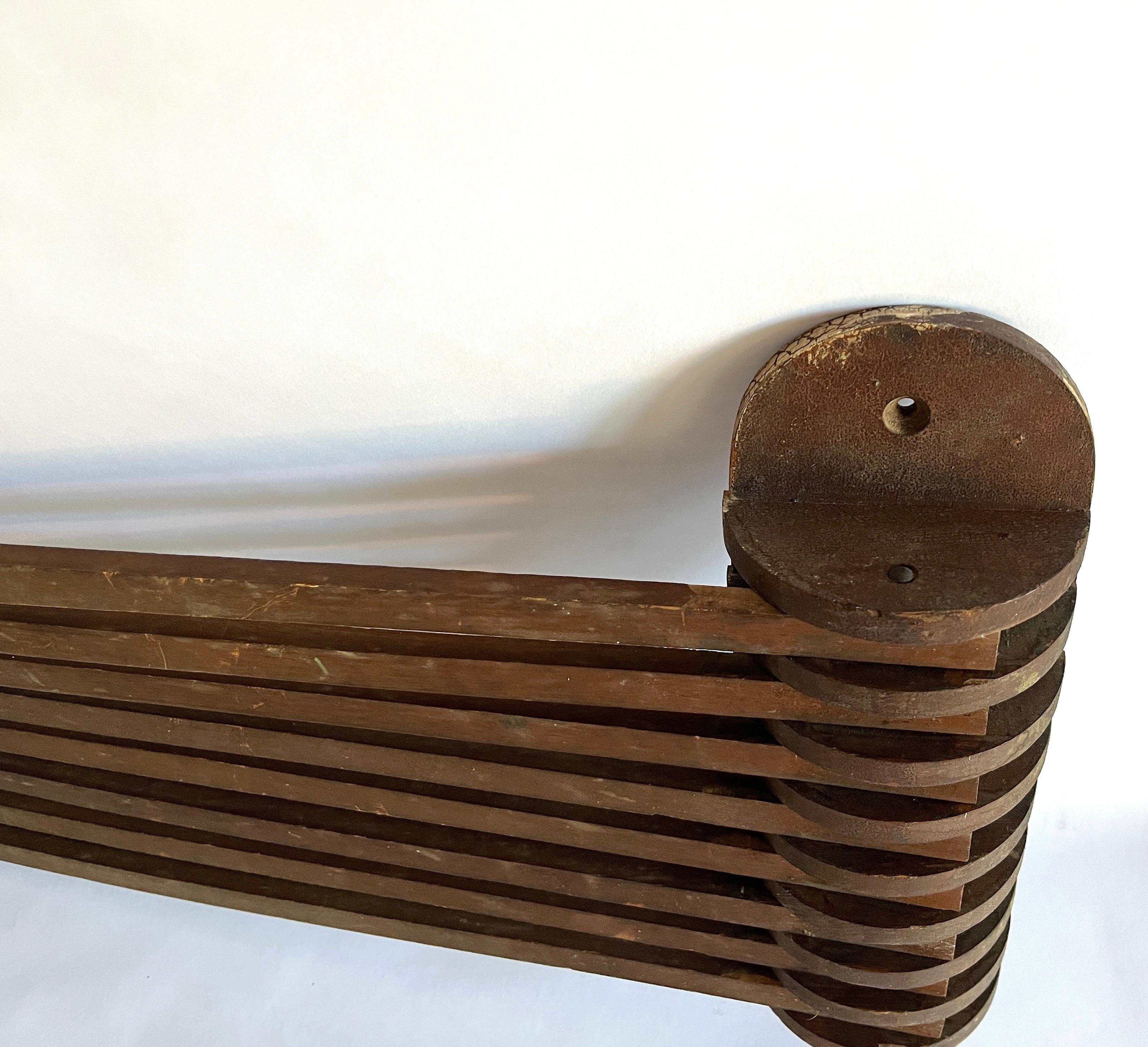Antique wall-mounted, solid wood folding clothes drying rack, labeled 