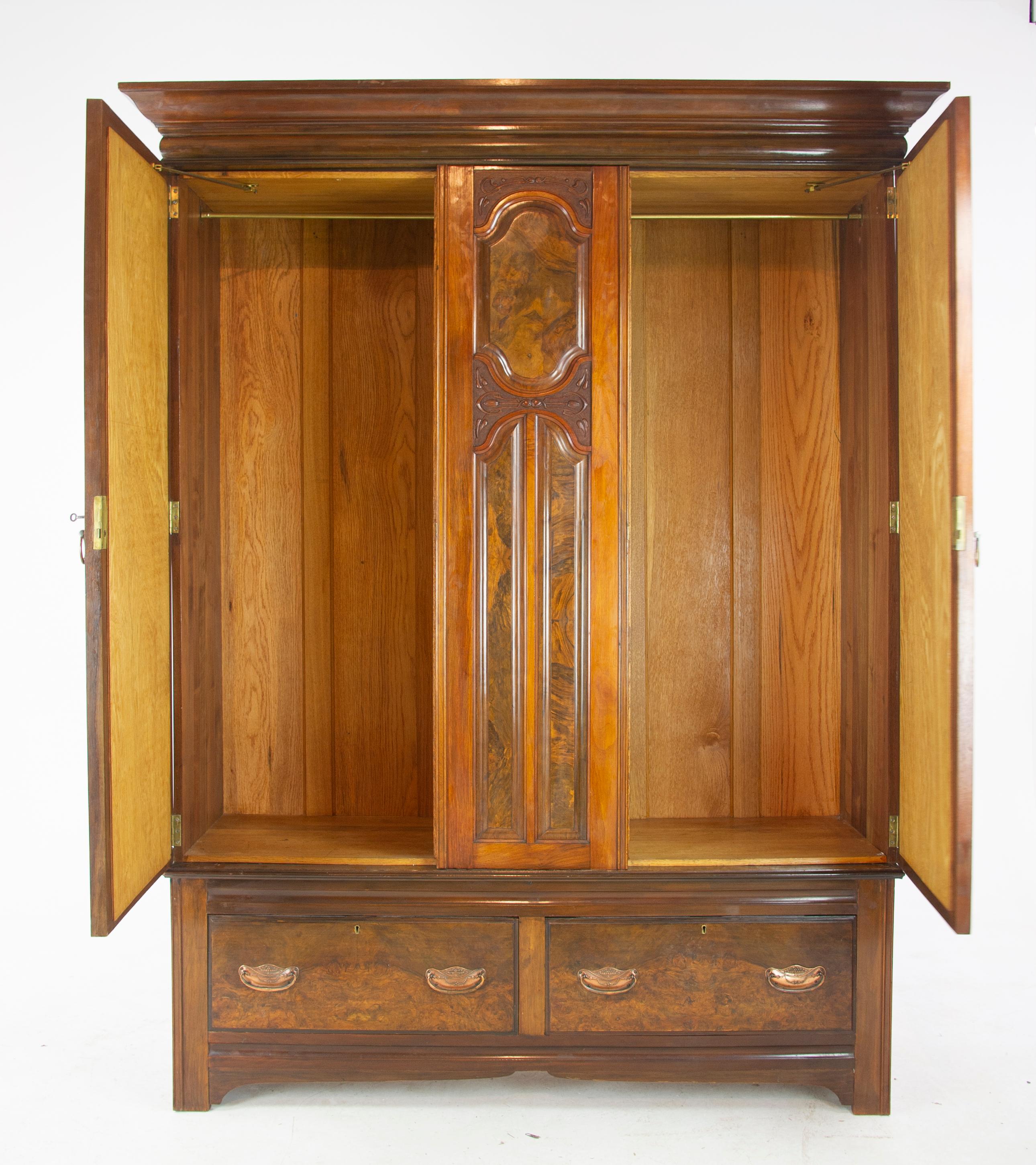 Antique walnut armoire, three-door armoire, vintage wardrobe, Scotland 1895, Antique Furniture, B1184

Scotland 1895
Solid walnut and veneers
Original finish
Cornice above
Pair of shaped beveled mirrors
Open to reveal hanging