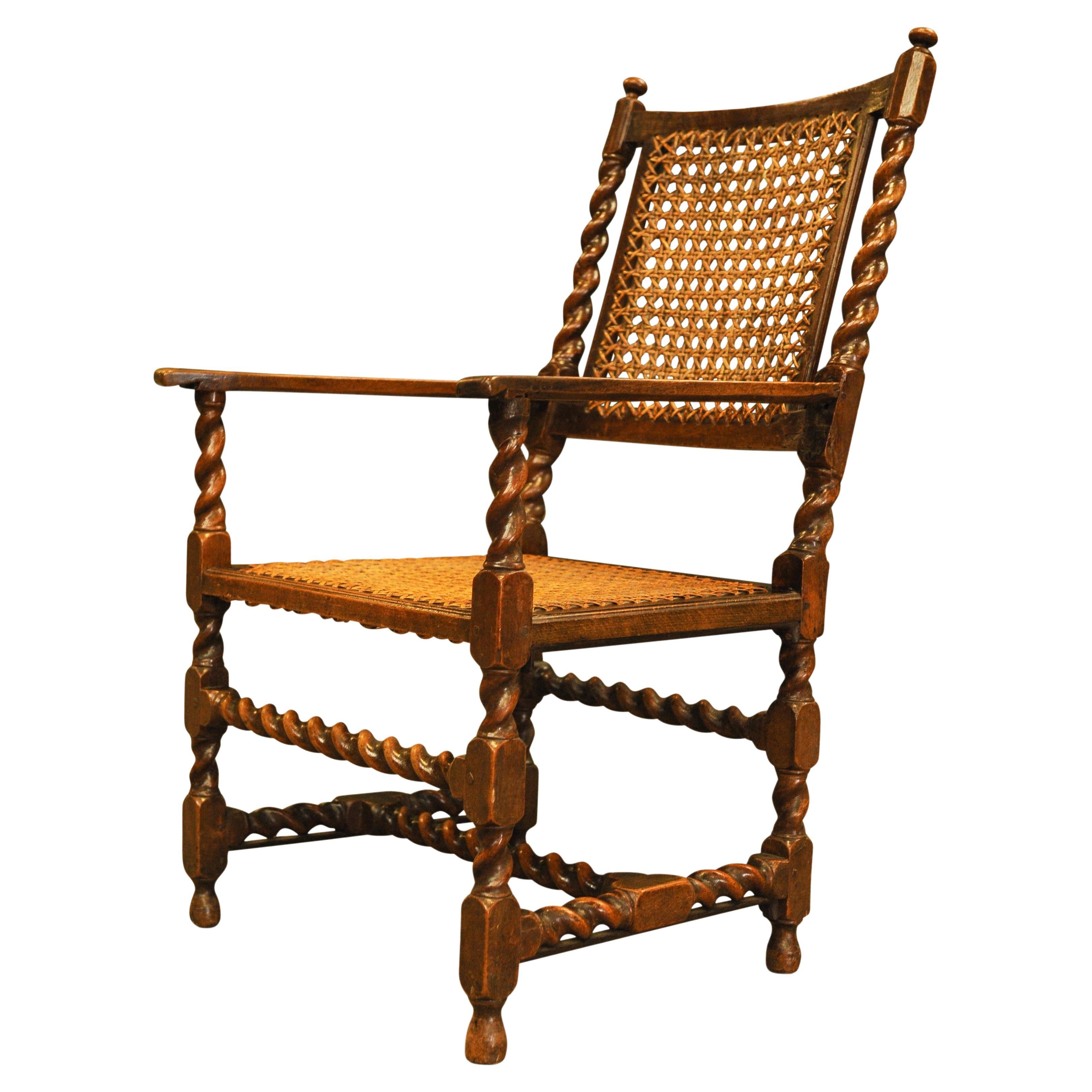 Antique Walnut Barley Twist Library Armchair with Cane Seat & Rear

Extra dimensions 
Seat width: 52cm I Seat depth: 47cm