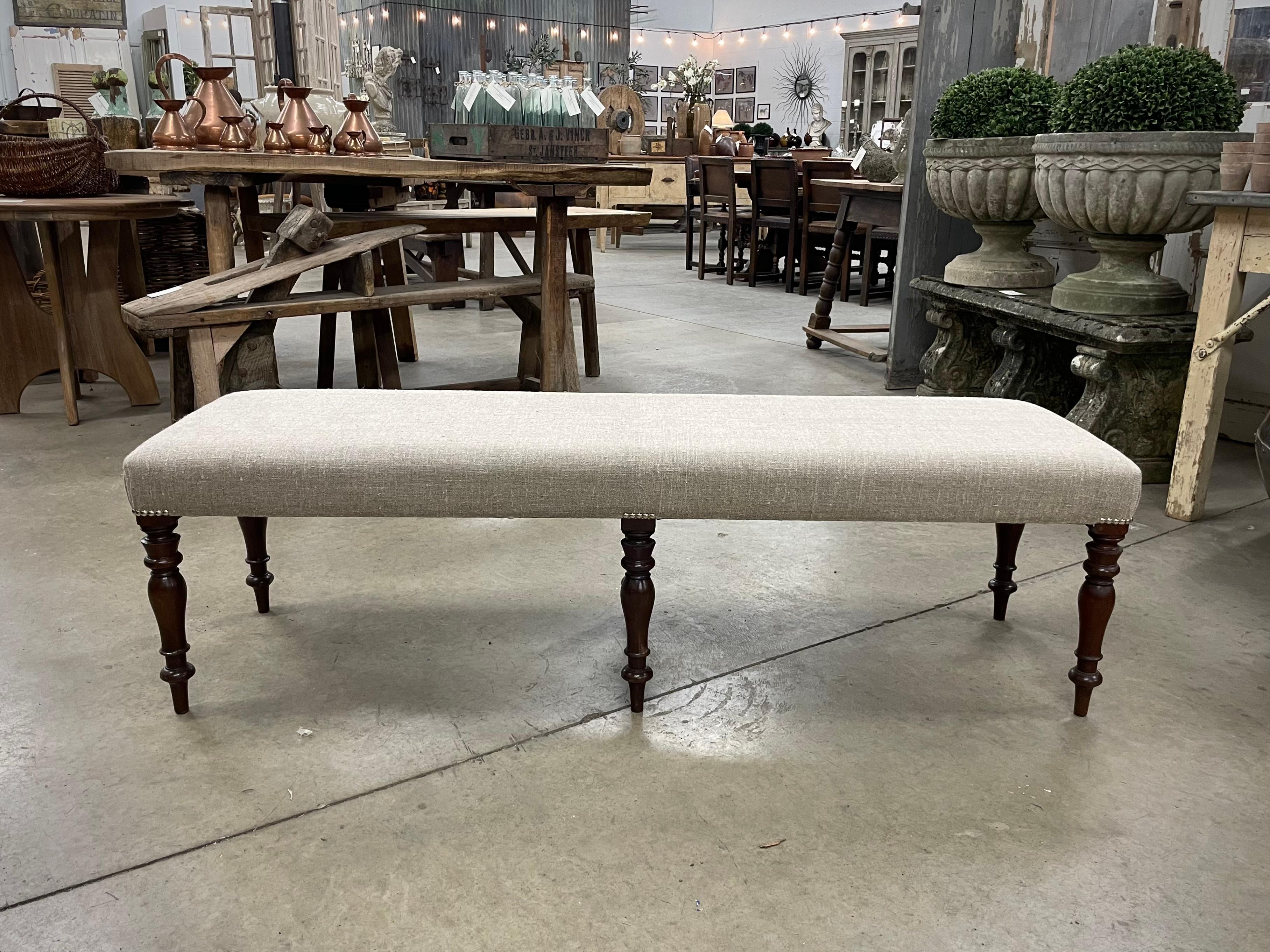 antique bench with cushion