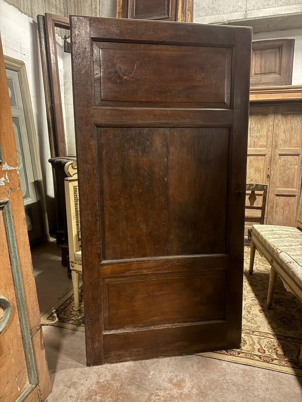 Walnut entrance door with three doors, carved panels and central knocker, italy 4