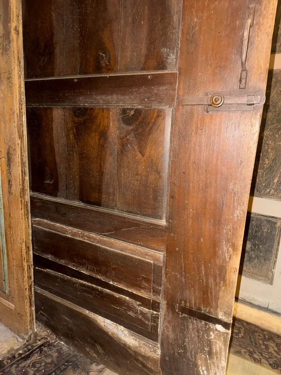 Walnut entrance door with three doors, carved panels and central knocker, italy 6
