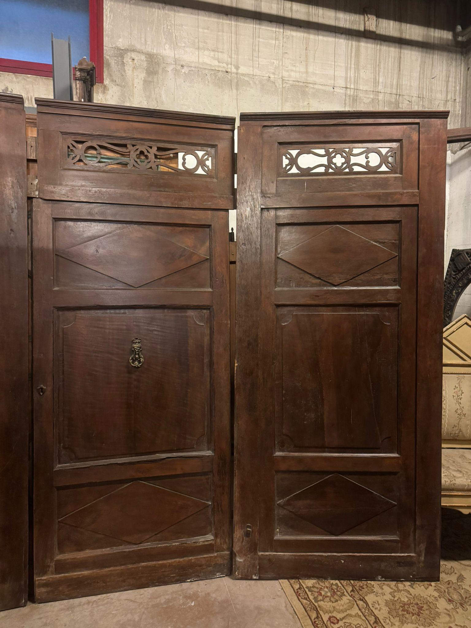 Walnut entrance door with three doors, carved panels and central knocker, italy 9