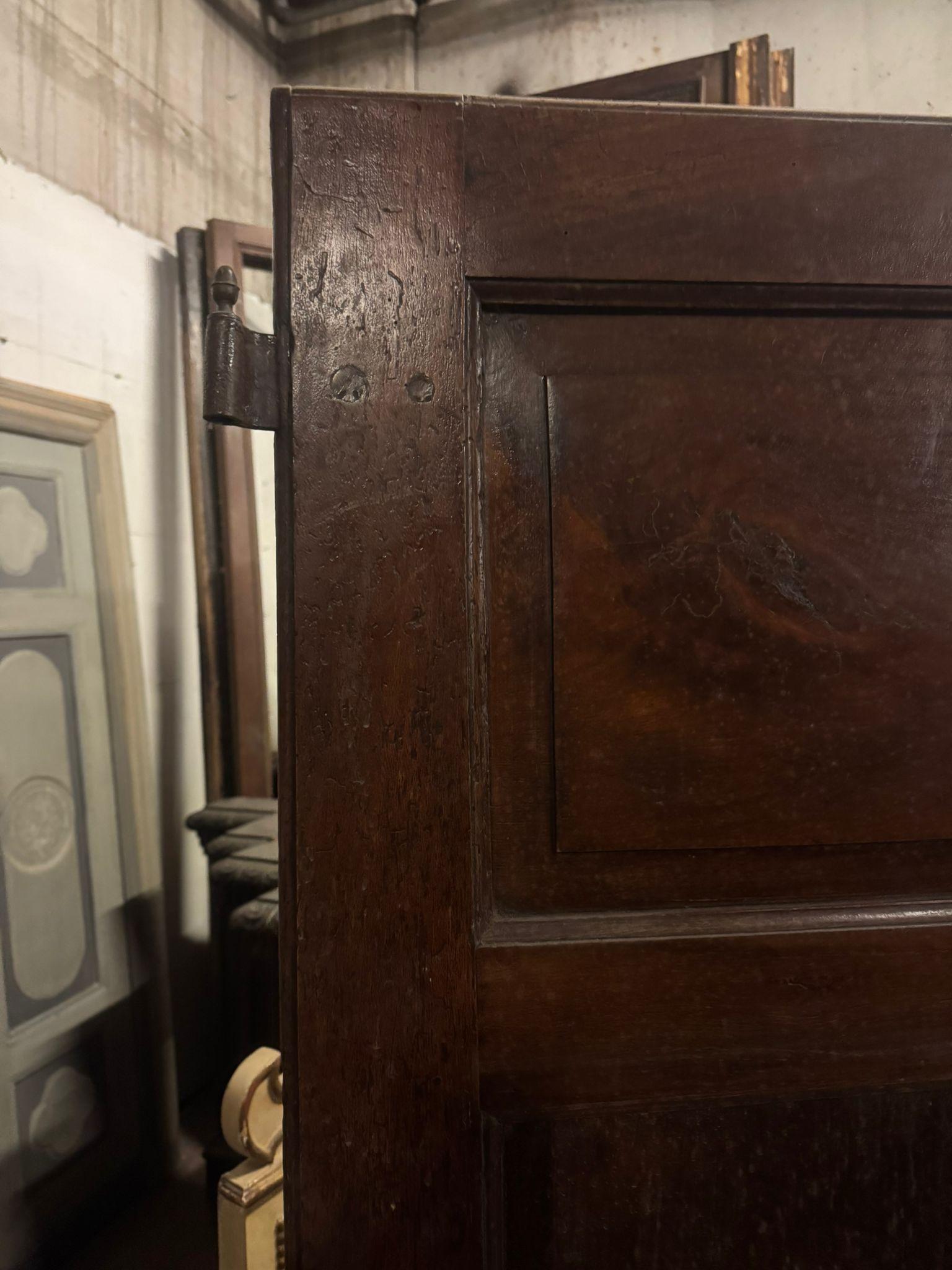 Walnut entrance door with three doors, carved panels and central knocker, italy 3