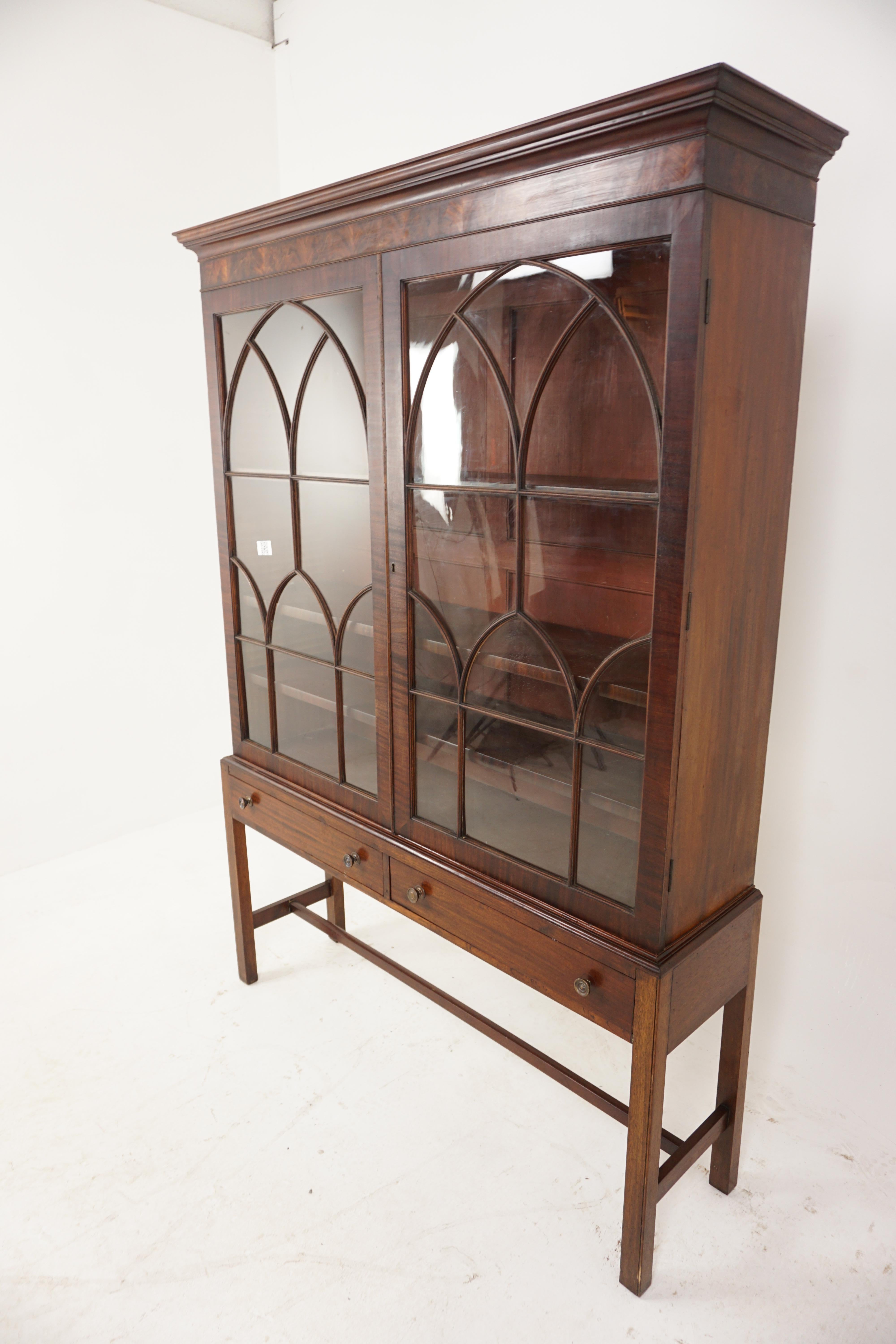 Antique Walnut Bookcase, Glass Fronted Bookshelf, Display on Later Stand, Scotland 1840, H964

Scotland 1840
Solid Walnut
Original Finish
Moulded Cornice On Top 
Pair of Original Glass Doors with Shaped Molding on the Front
Sitting on the
