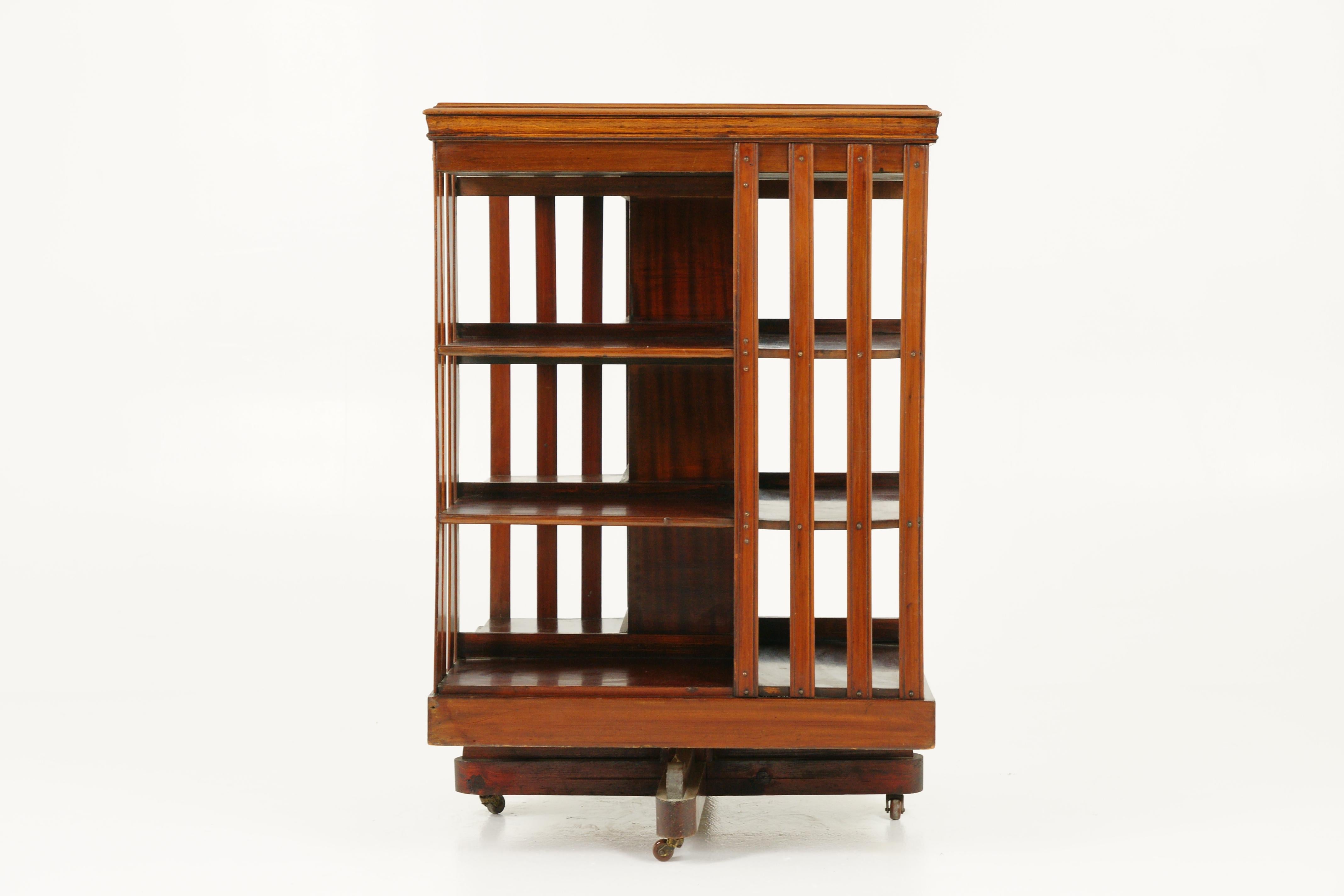 Antique walnut bookcase, inlaid three-tier revolving library bookshelf, antique furniture, Scotland 1910, B1646

Scotland, 1910
Solid walnut
Original condition
Inlaid on square moulded top of
Three tier shelving below with original slatted