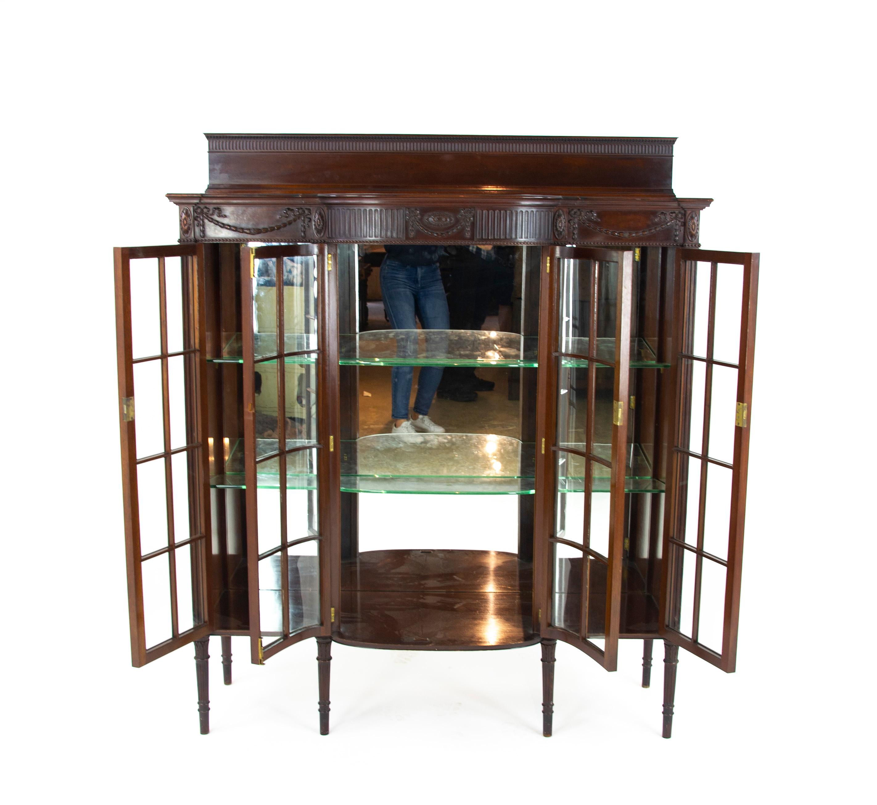 Antique walnut cabinet, breakfront display cabinet, china cabinet with mirror back, Scotland 1920, antique furniture, B1513

Scotland 1920
Solid walnut
Original finish
Detailed pediment top
Breakfront top
Swag ornamentation below
Pair of bow