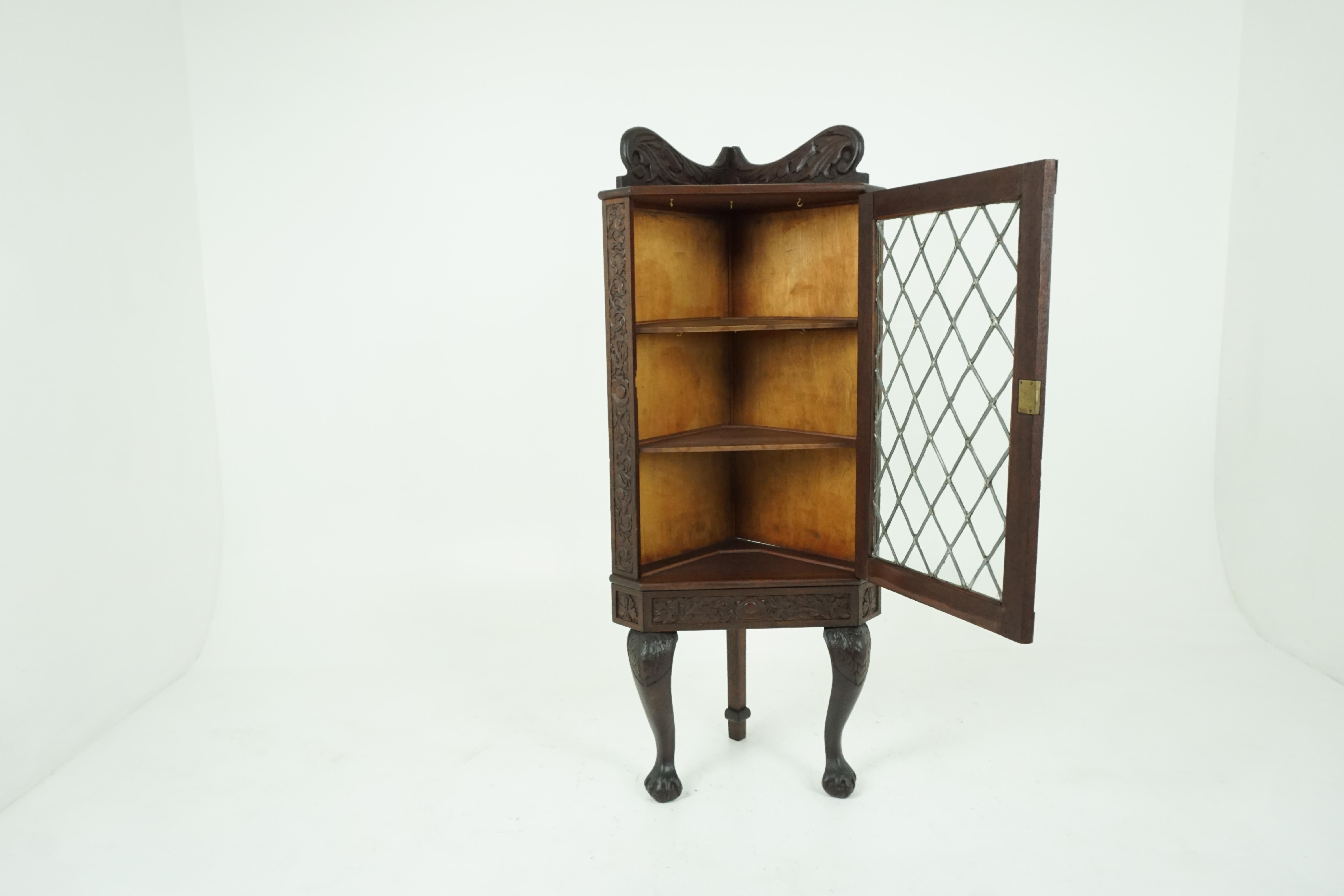 Antique walnut cabinet, heavily carved leaded glass corner china curio cabinet, antique furniture, Scotland, 1880, B1869

Scotland, 1880
Solid walnut
Original Finish
Shaped carved pediment to the top
Single carved leaded glass door
Opens to reveal