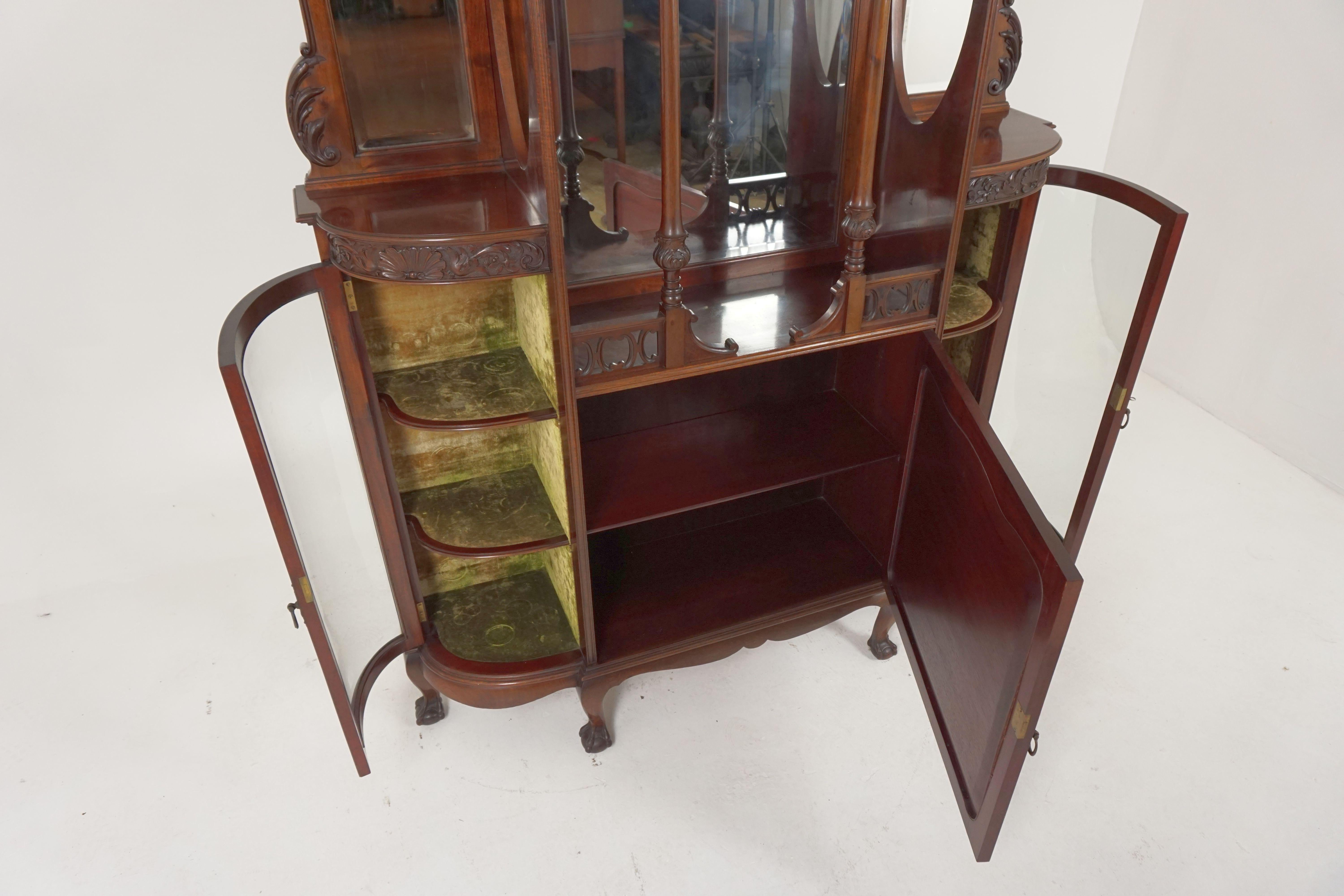 Antique walnut cabinet, Victorian carved parlor cabinet or display cabinet, antique furniture, England, 1880, B1864

England, 1880
Solid walnut
Original finish
Shaped top with carved gallery to the back
Central beveled mirror is surrounded by