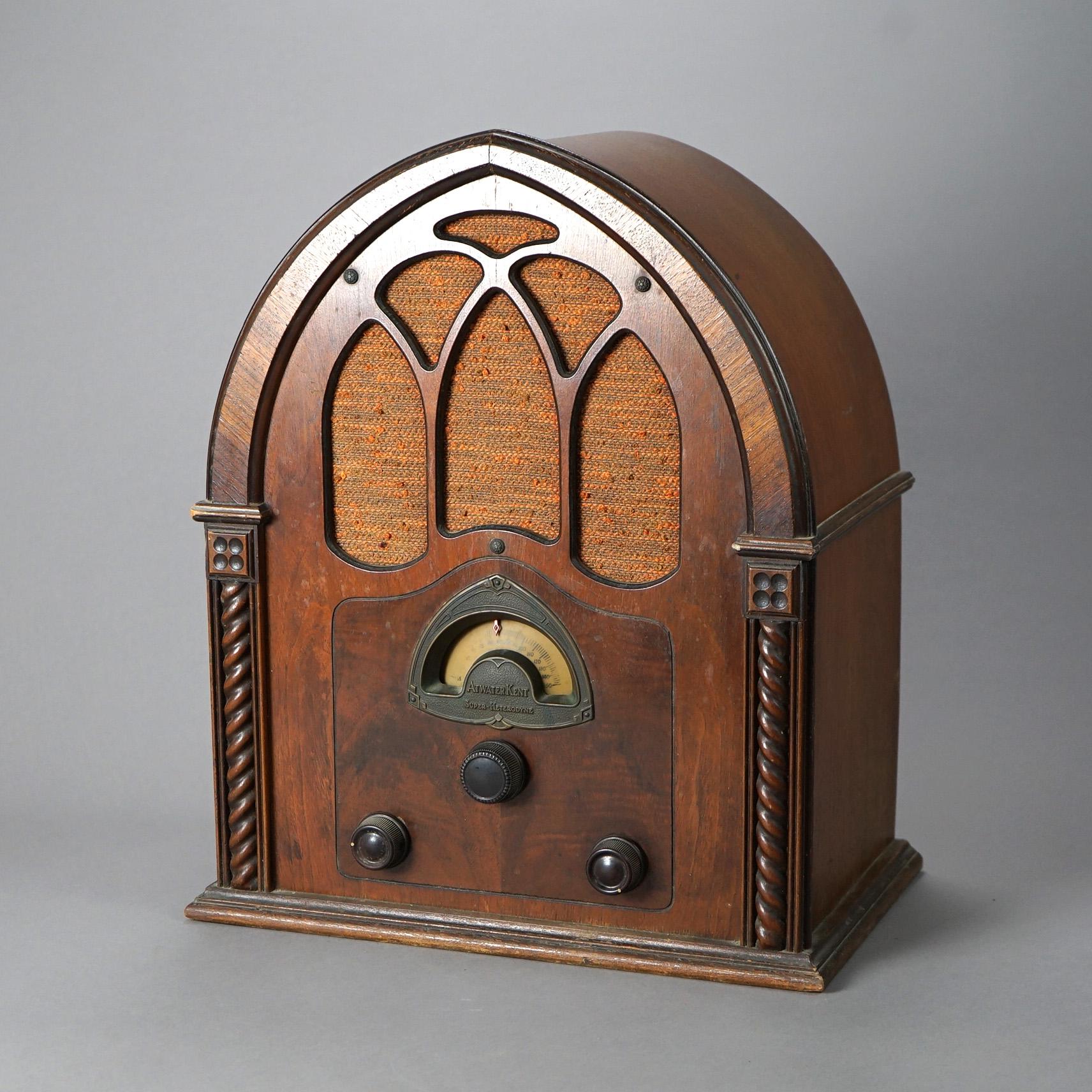 An antique Atwater Kent Model 82 Super-Heterodyne radio offers walnut case in cathedral form, original label as photographed, working condition untested, c1930

Measures - 19