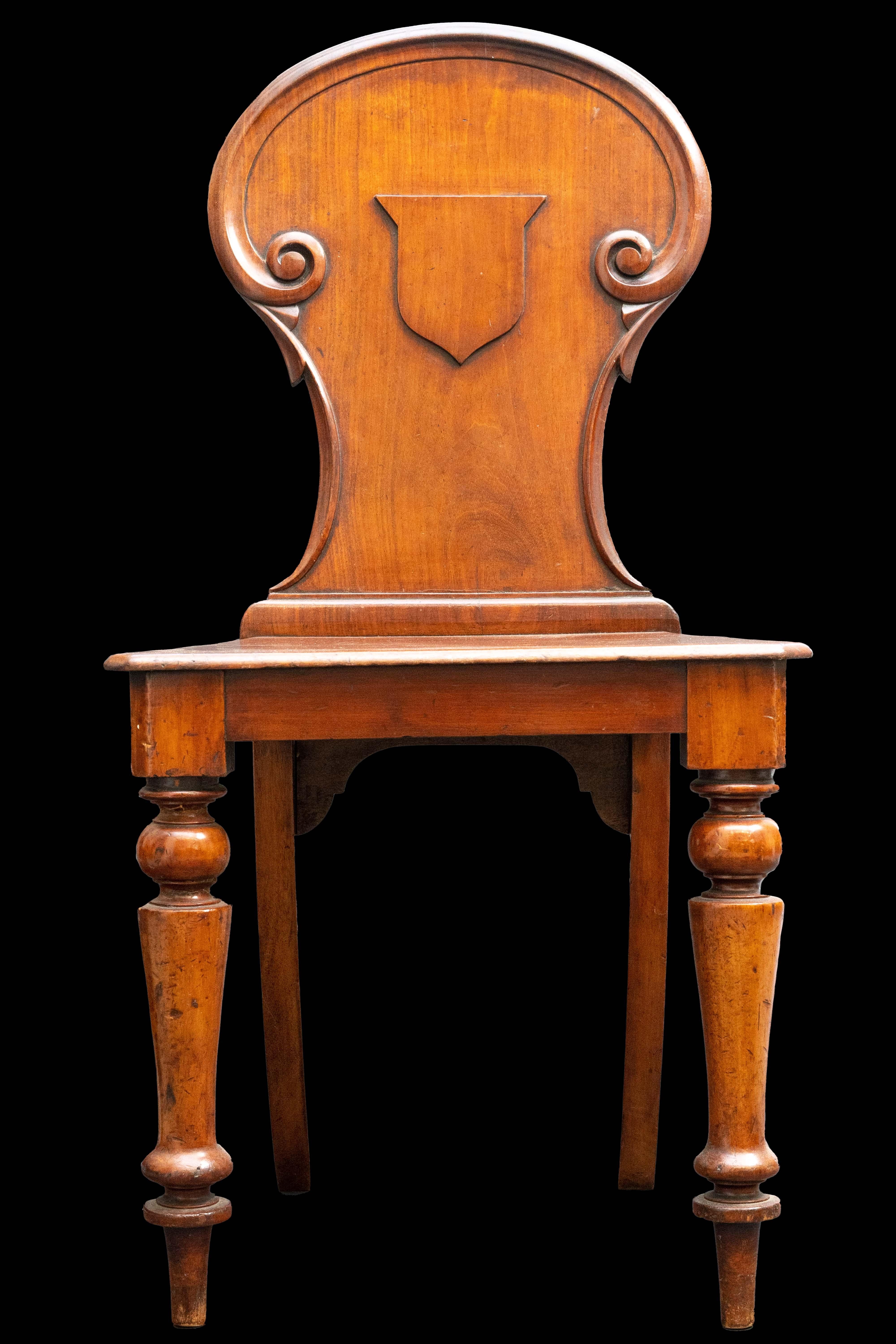 Antique walnut chair w/ crest detail.