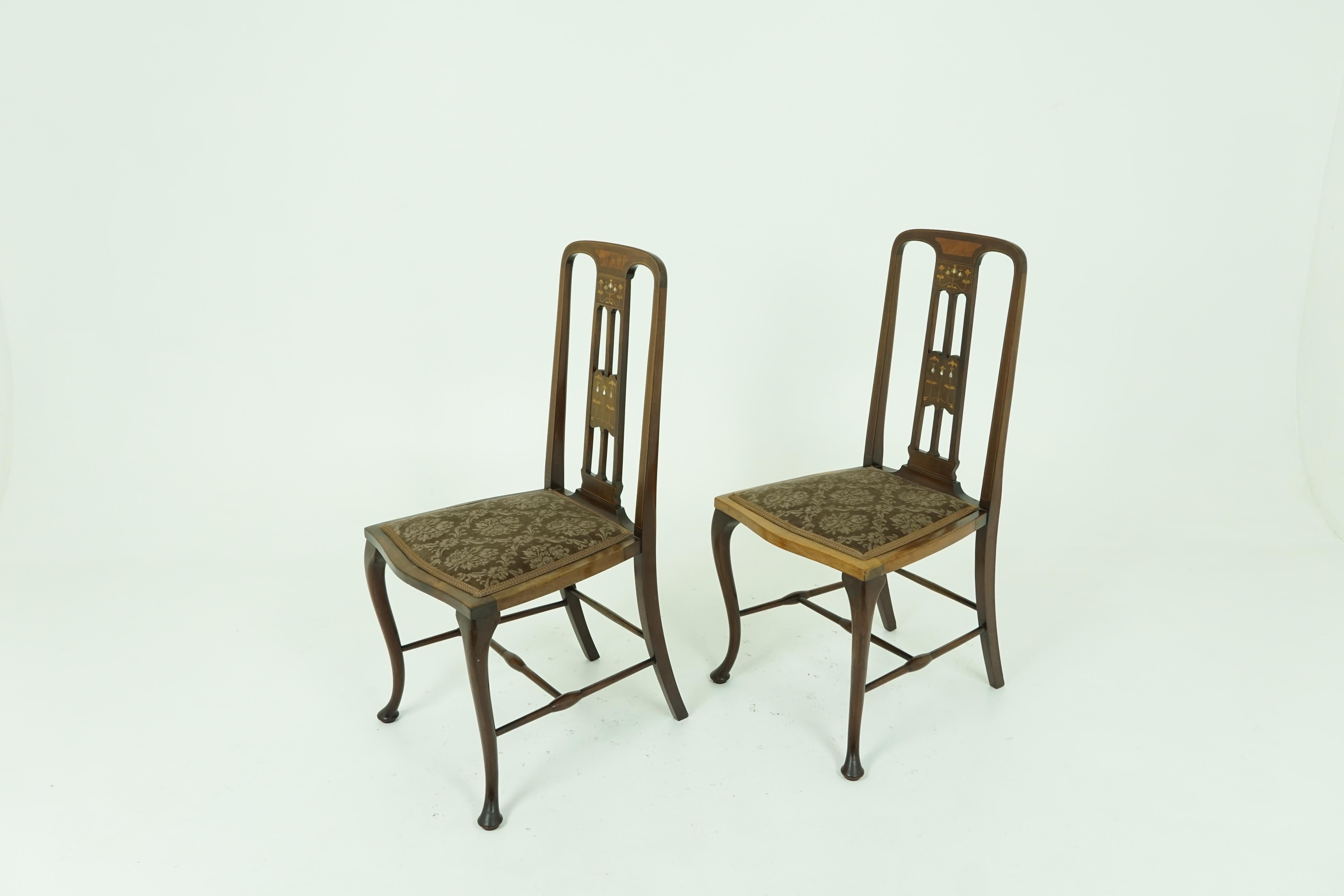 Antique walnut chairs, pair of Art Nouveau inlaid upholstered seats, antique furniture, Scotland 1910, B1887

Scotland, 1910
Solid walnut and veneers
Original finish
Finely inlaid back
Stylized inlaid flower heads with mother of pearl