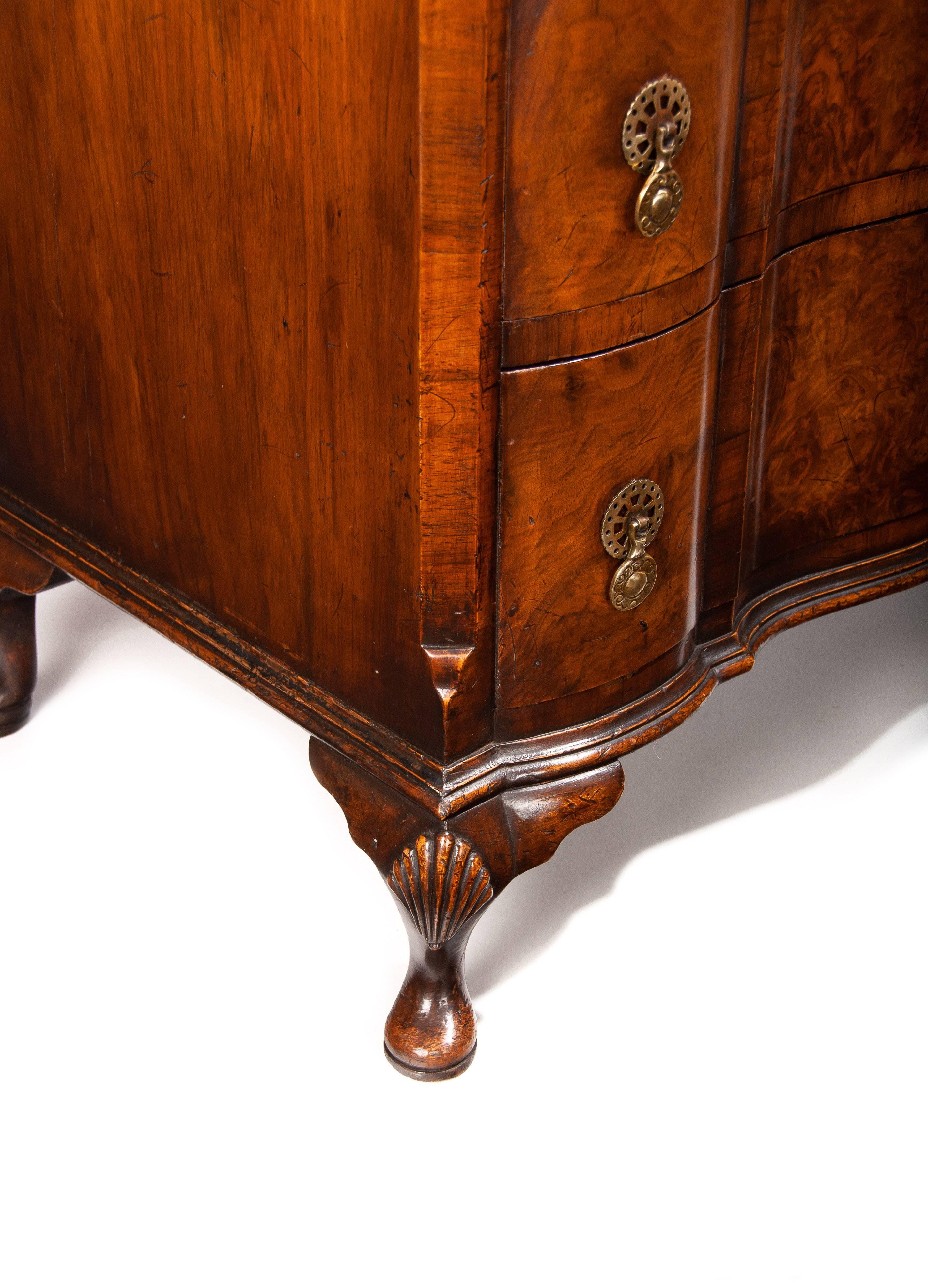 Queen Anne Antique Walnut Chest of Drawers of an Elegant Shaped Front Design