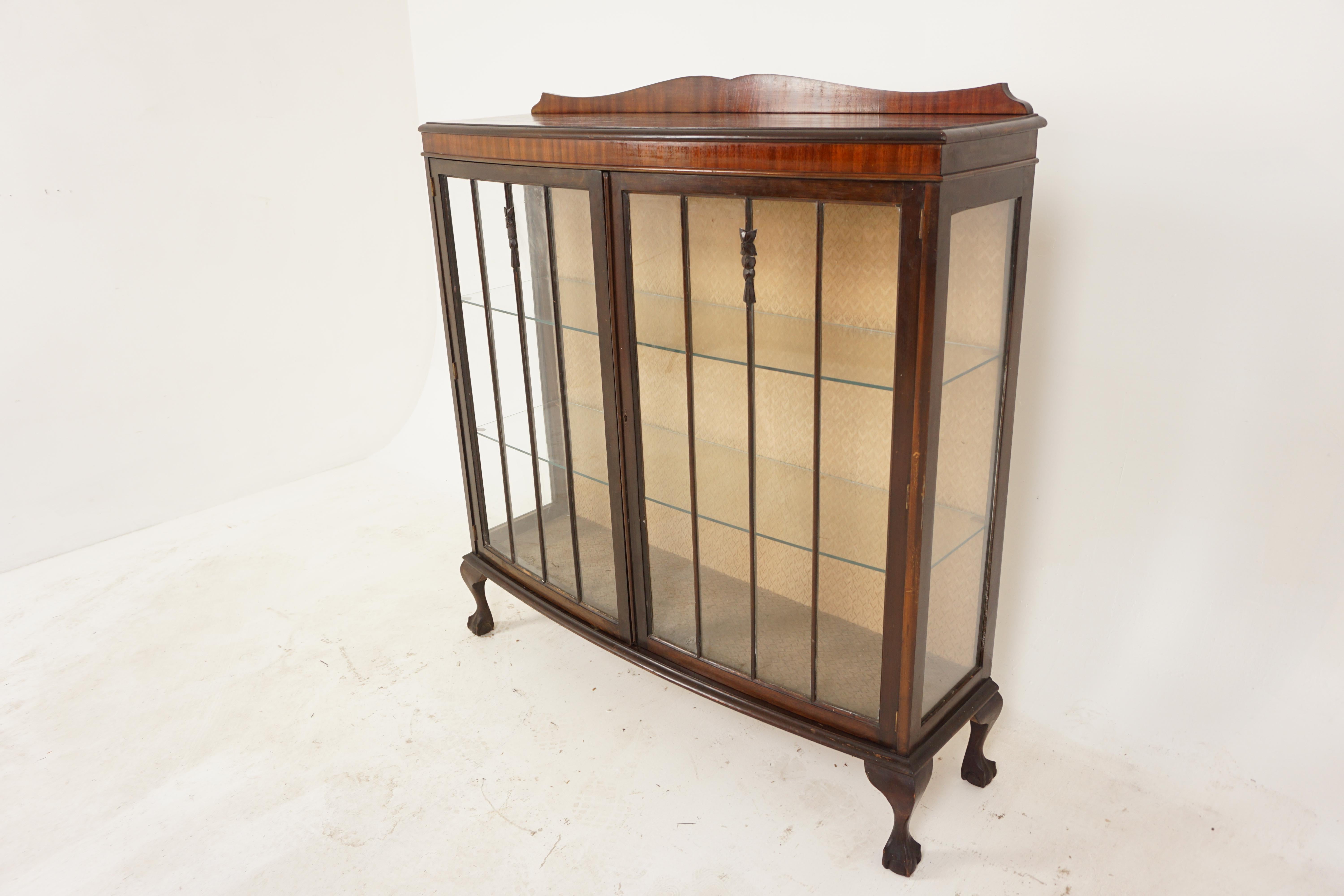 Antique walnut China cabinet, Display cabinet, Scotland 1920, B2682

Scotland 1920
Solid walnut
Original finish
Bow front top with small pediment on the back
Pair of original glass doors with wooden molding on the front.
Glam sides
Comes