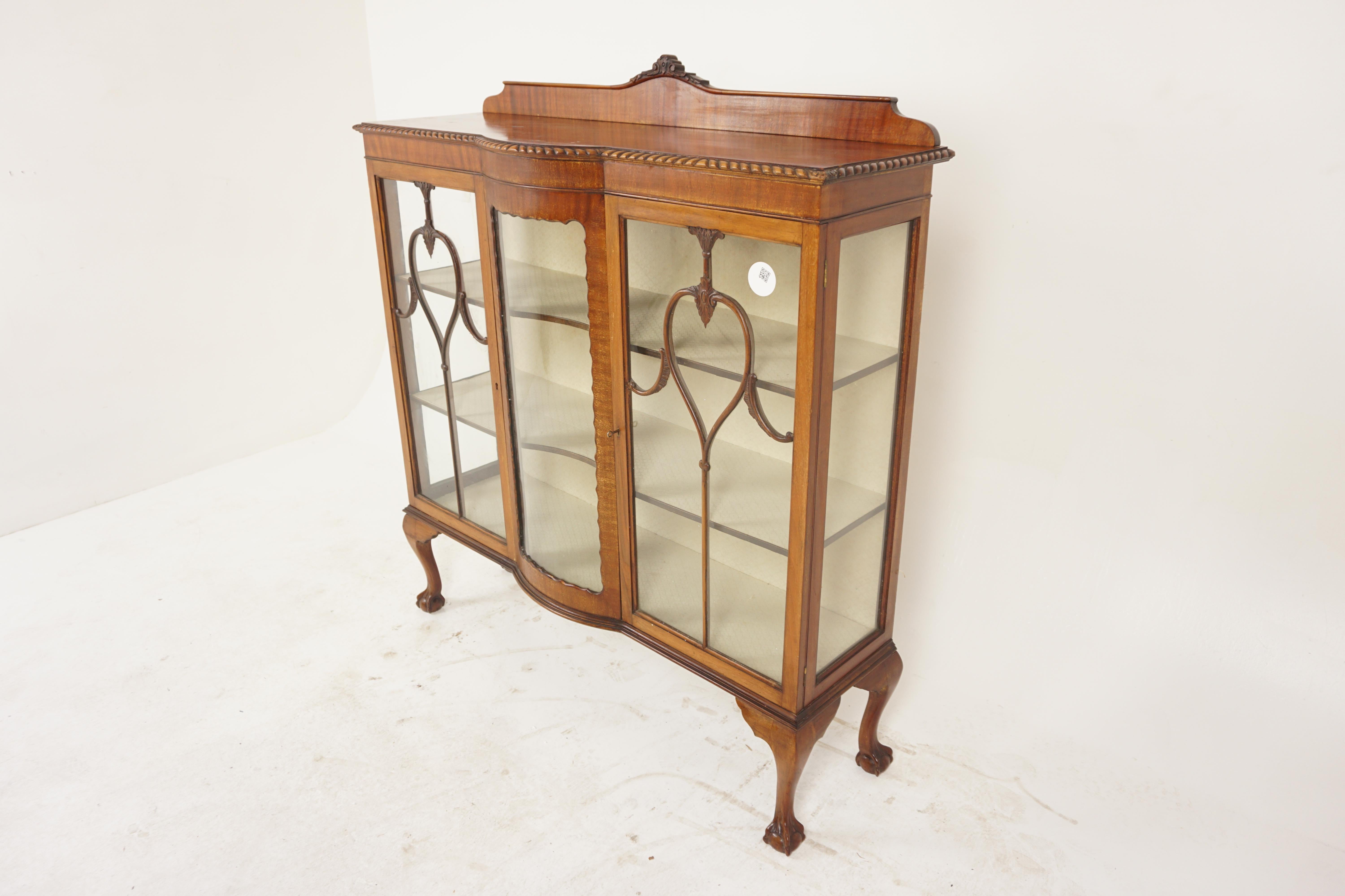 Antique Walnut China Cabinet, Display Shelves, Scotland 1910, H1011

Solid Walnut
Original finish
Pediment on top
Slight bow front with rope edging
Single bow front original glass door
With wonderful shaped moulding on front
Opens to reveal pair of