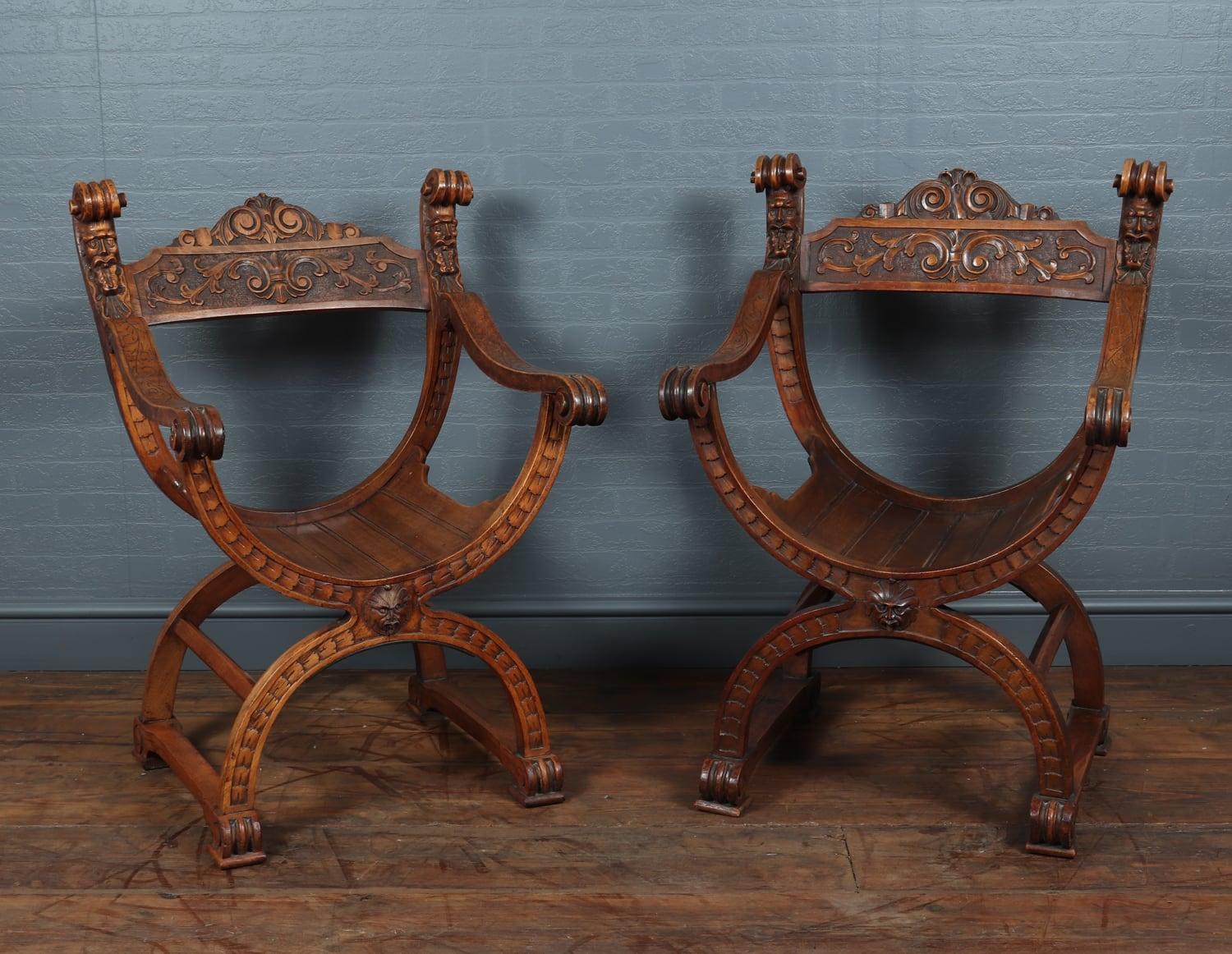 Antique walnut curule chairs, circa 1880

A Matched pair of Italian hall chairs in solid walnut, intricately carved from the Renaissance Revival period. Each chair having a curule form seat mounted with a horizontal back and having carved acanthus