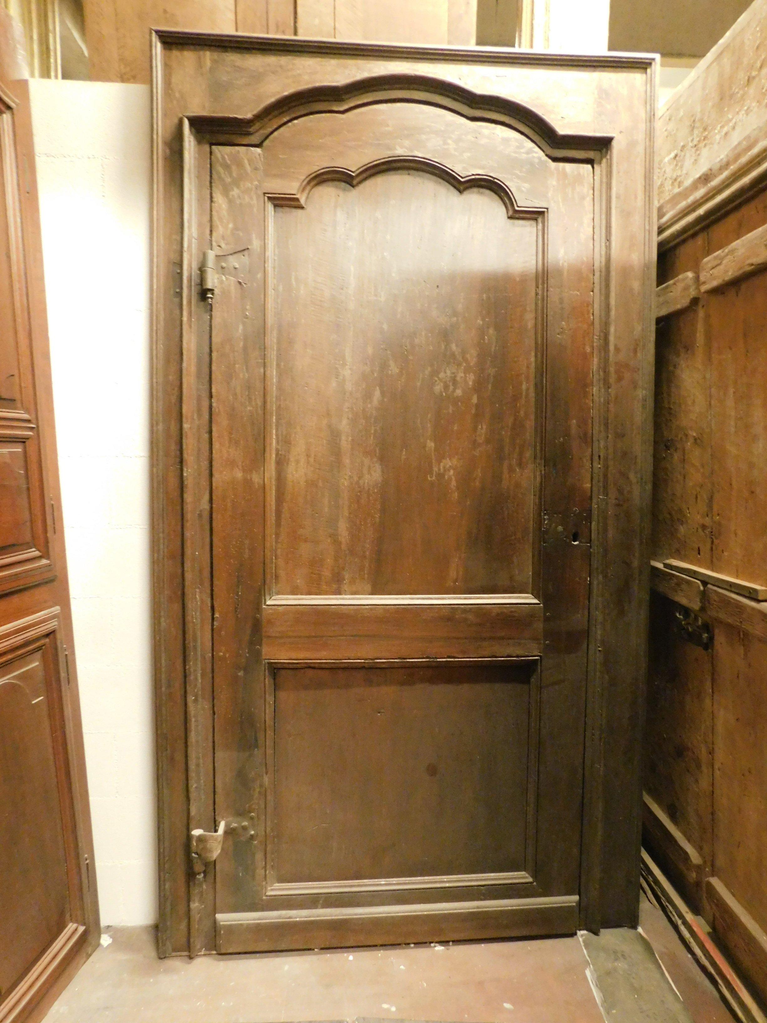 Antique walnut door with frame, carved with a double panel and moved bar, built in the 18th century for a noble house in northern Italy (Piedmont), measuring cm 137 x H 247 x D 5, only the door measuring cm 105 x H 234 cm.
Very beautiful,