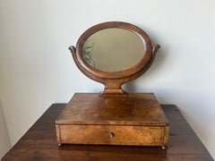 Antique walnut dressing table mirror with drawer. France, early 19th century