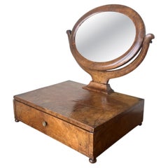 Antique walnut dressing table mirror with drawer. France, early 19th century