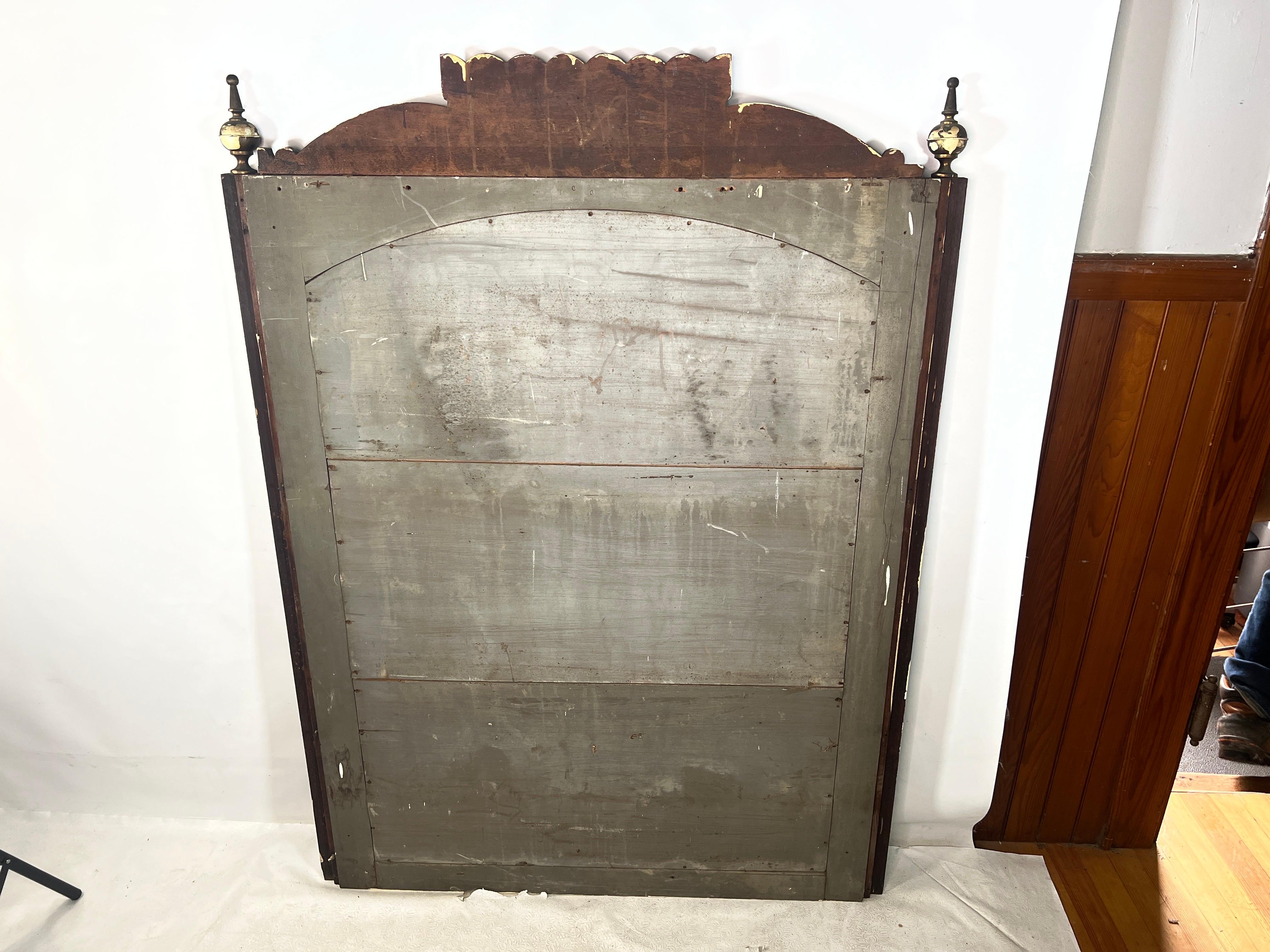 For sale is this nice large antique Pier mirror. The mirror is made out of walnut.