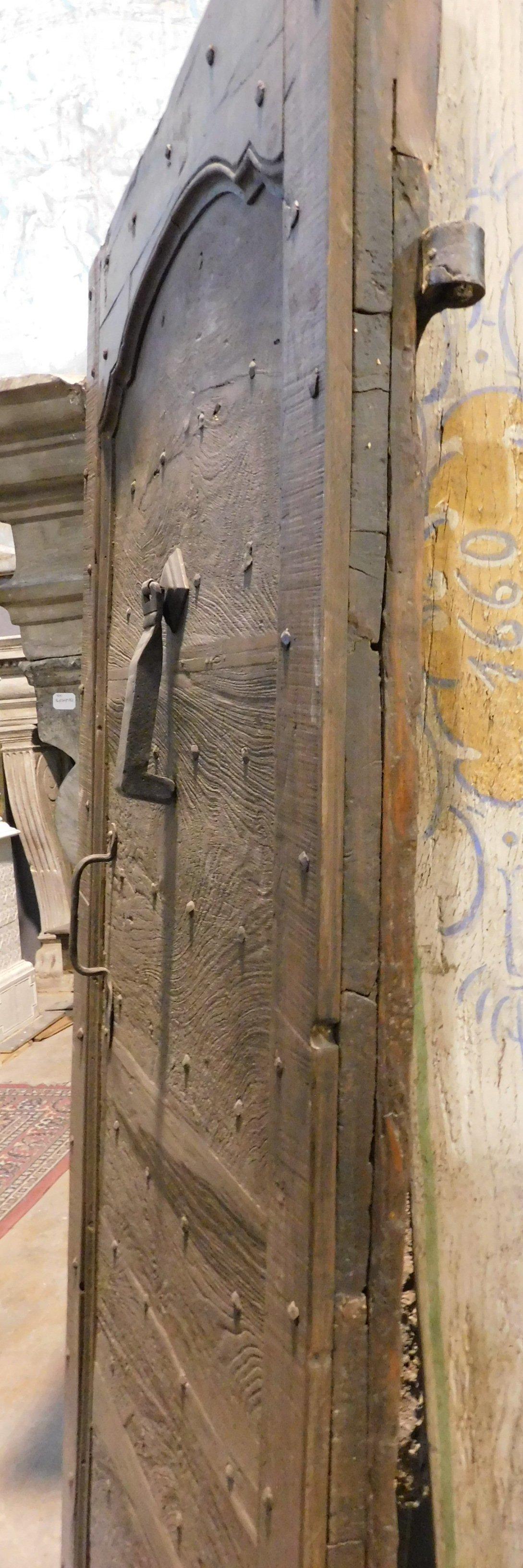 18th Century and Earlier Antique walnut entrance door in rustic style, with nails, 18th century Italy