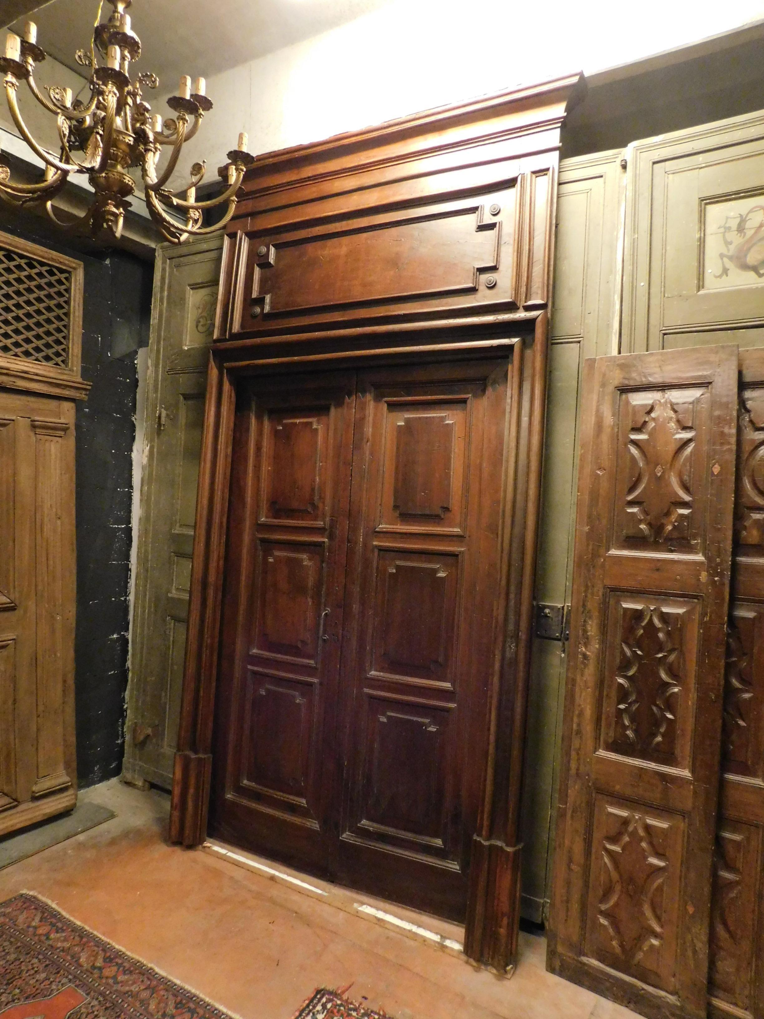 Hand-Carved Antique Walnut Entrance Main Door Complete with Portal, 18th Century, Italy For Sale