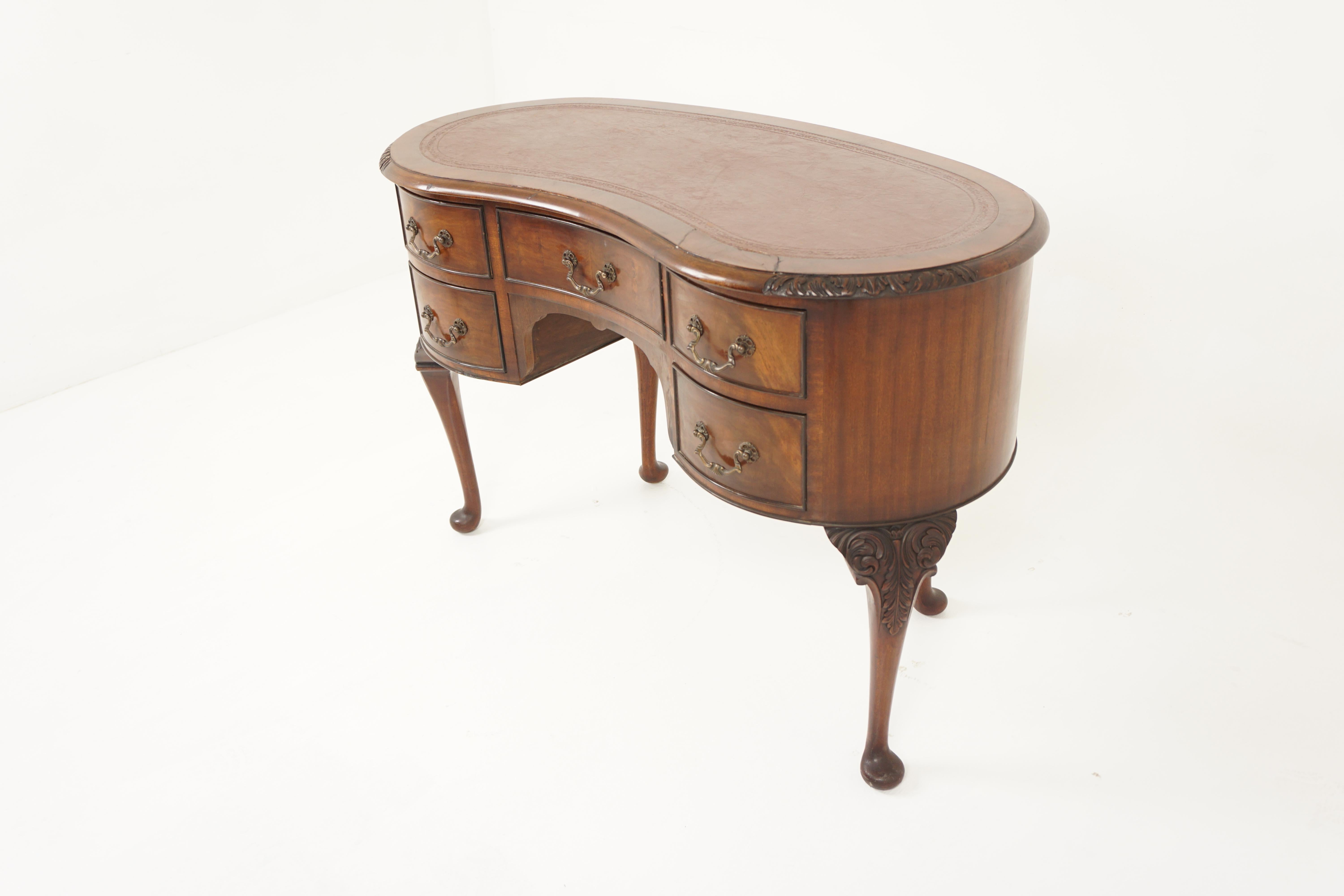 Antique Walnut Kidney Shaped Desk, Writing Table, Scotland 1920, H949

Scotland 1920
Solid Walnut and veneer
Original finish
Kidney shaped top with original hand tooled leather wiring surface
With Carved moulding underneath
Below are five dovetailed